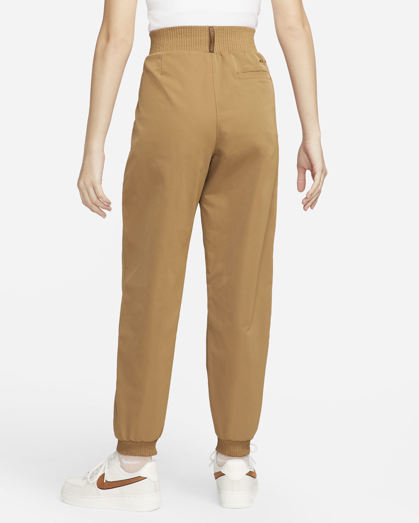 Nike Sportswear Dri-FIT Tech Pack Women's High-Waisted Trousers. Nike BE