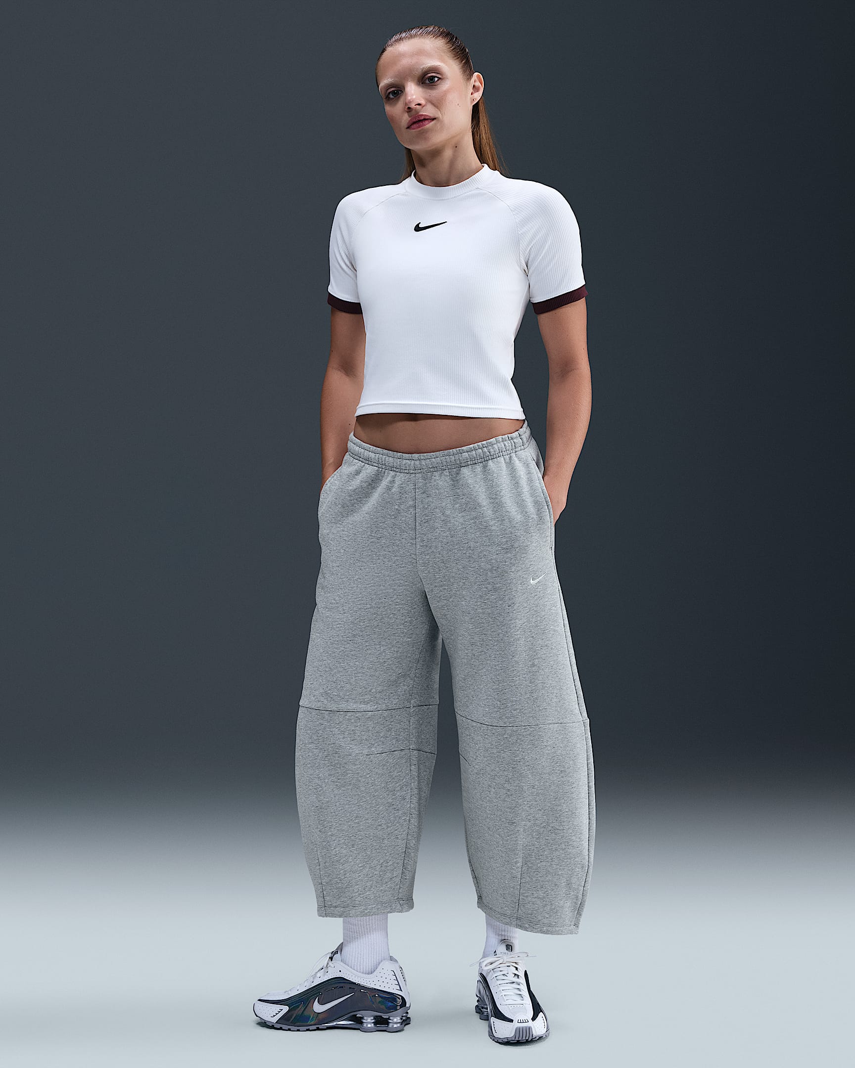 Pantalones entubados de tiro medio holgados para mujer Nike Sportswear Phoenix Fleece - Gris oscuro jaspeado/Jaspeado/Vela