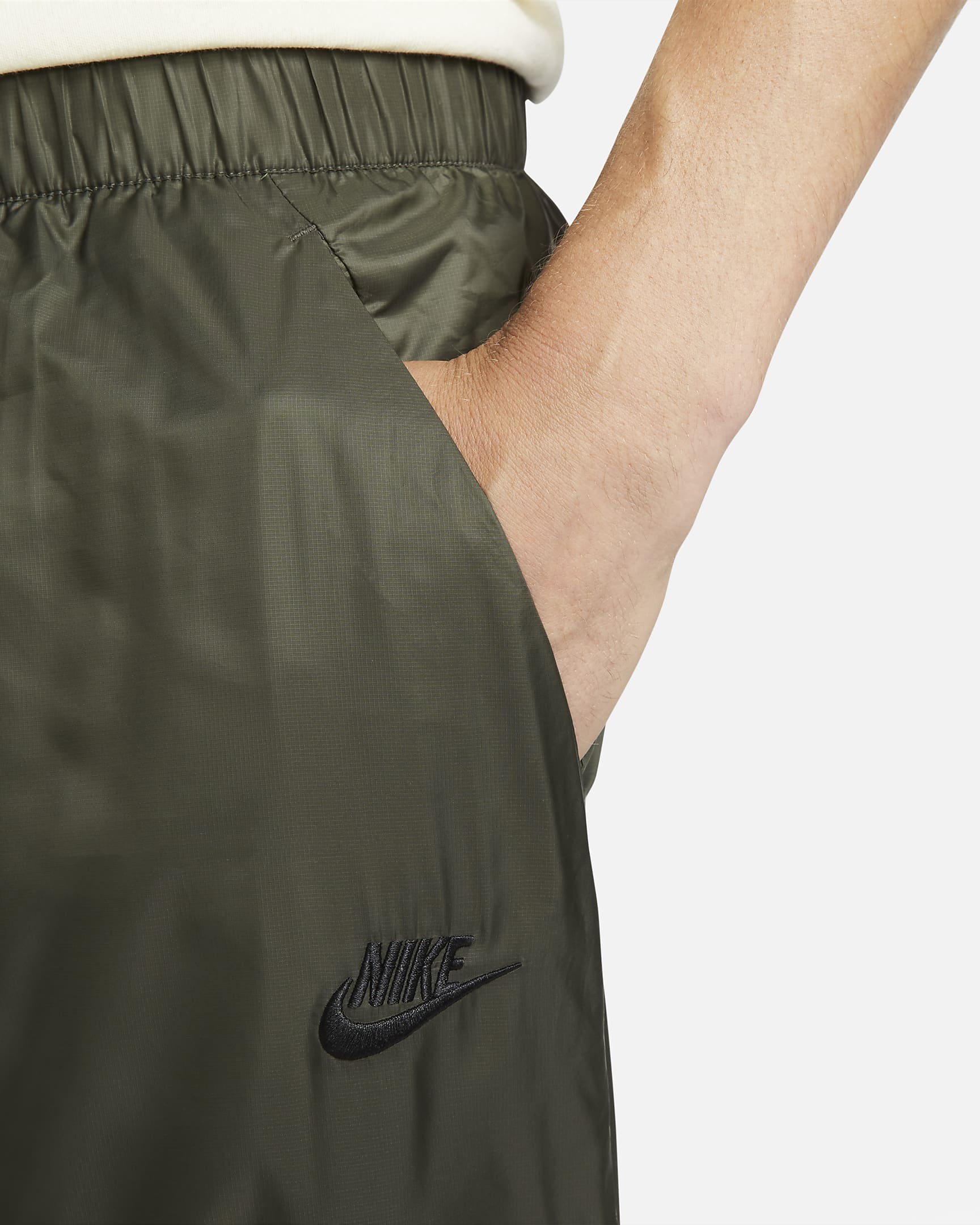 Męskie spodnie z tkaniny z podszewką Nike Tech - Cargo Khaki/Czerń