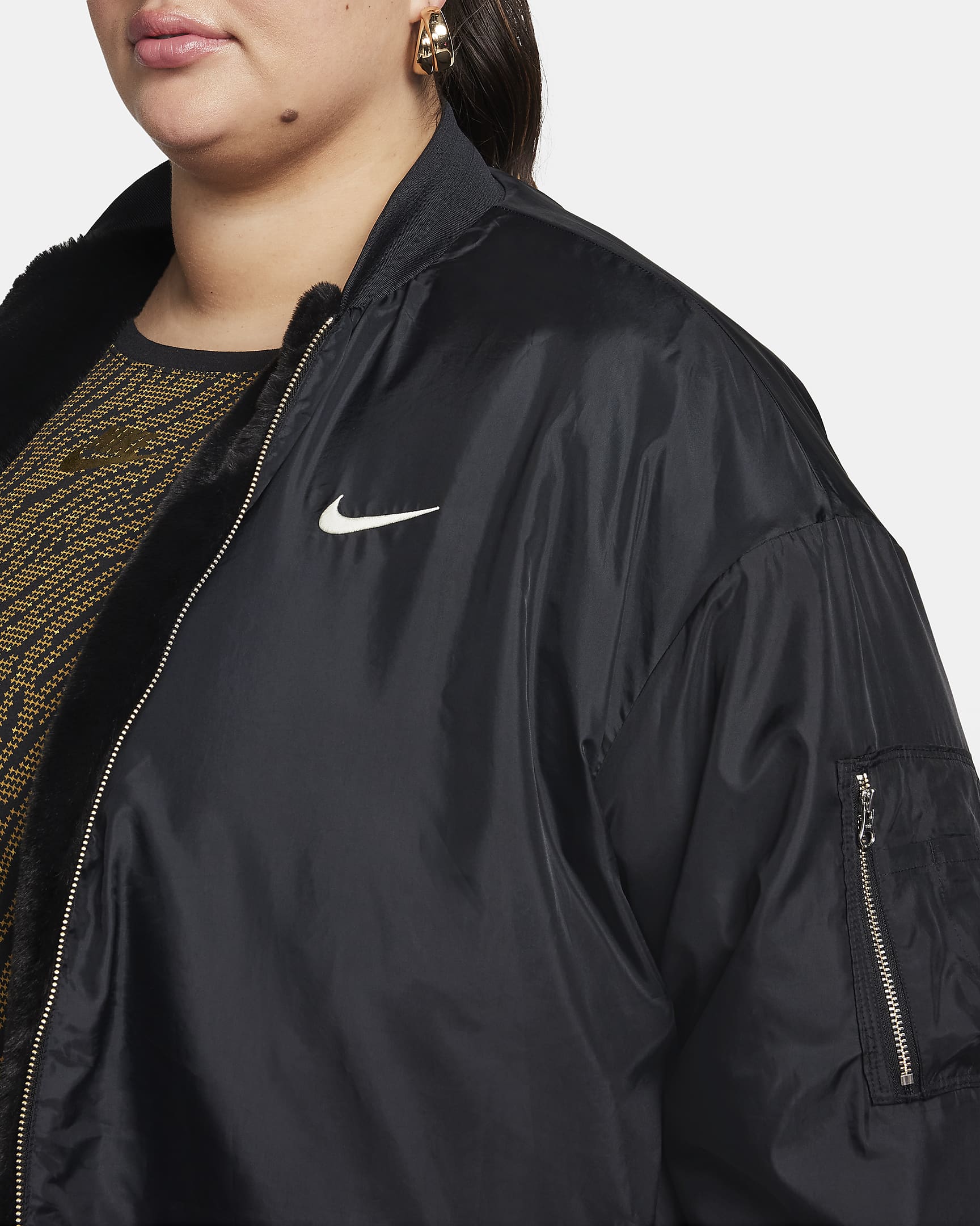 Nike Sportswear Women's Reversible Faux-Fur Bomber (Plus Size). Nike CH