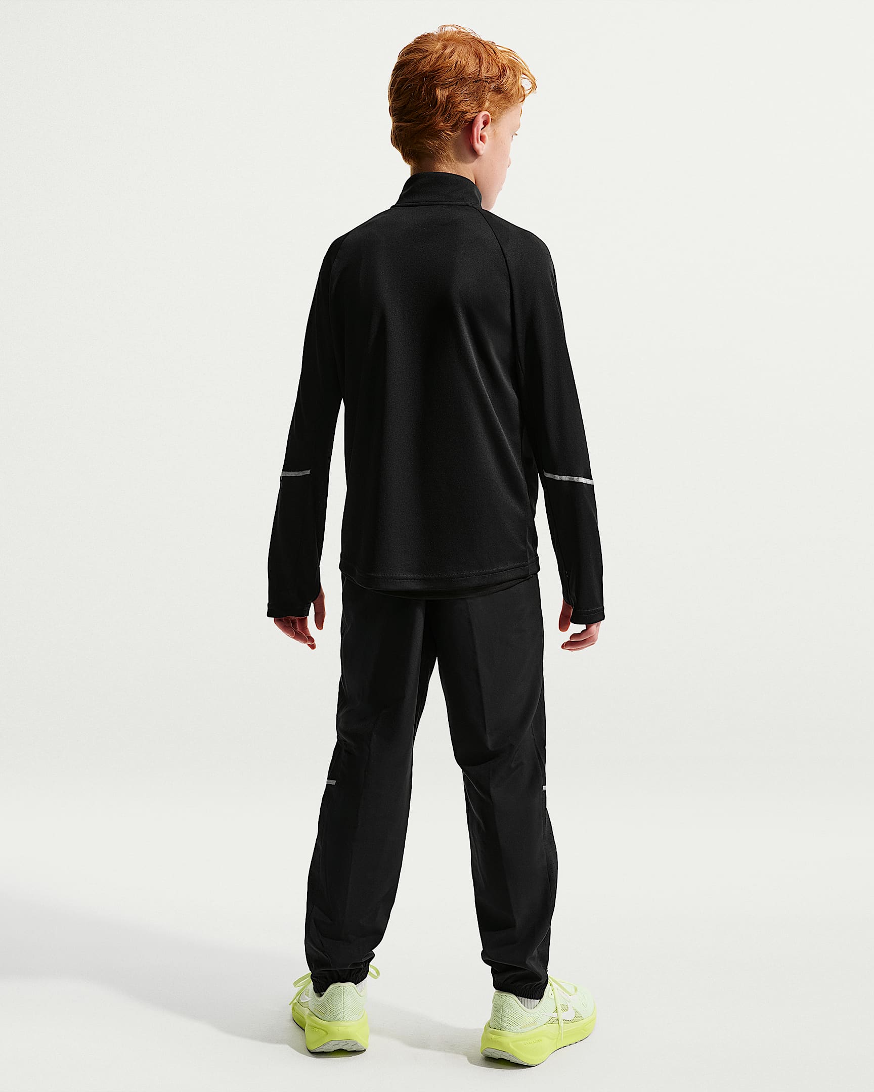 Nike Miler Older Kids' Dri-FIT Woven Trousers - Black