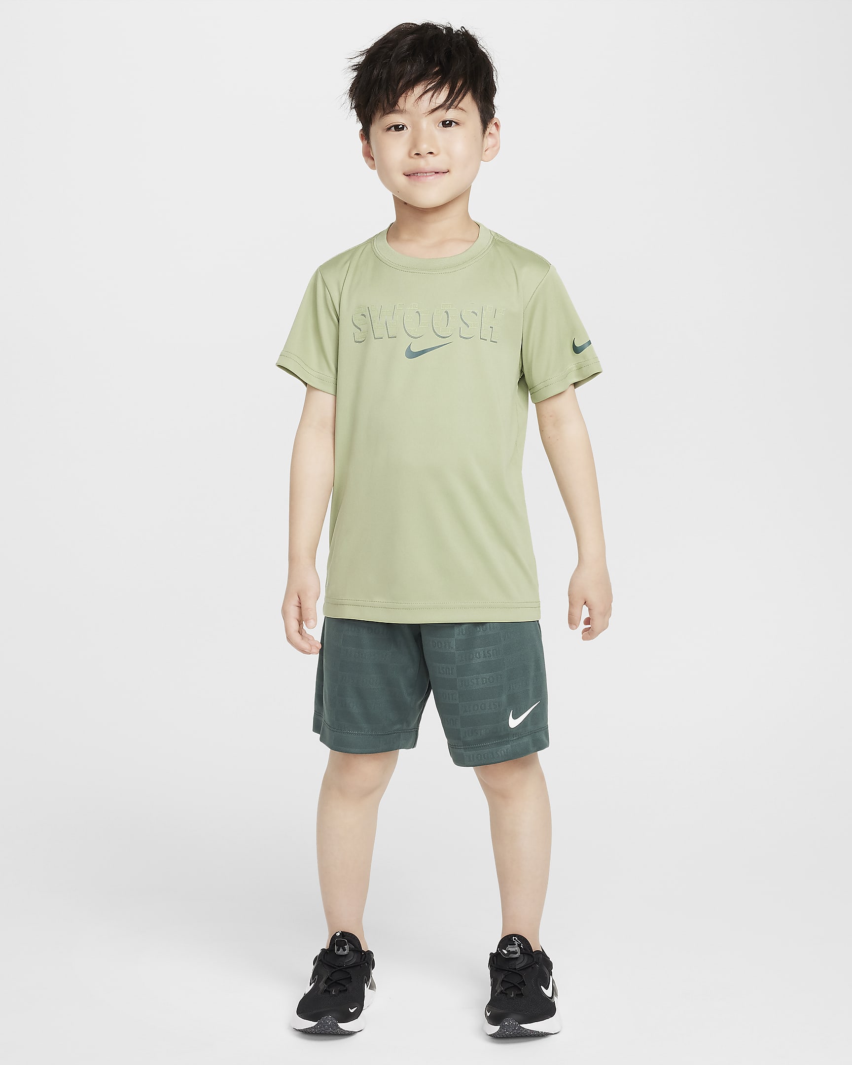 Playera Swoosh para niños talla pequeña Nike Dri-FIT "Just Do It" - Verde aceite