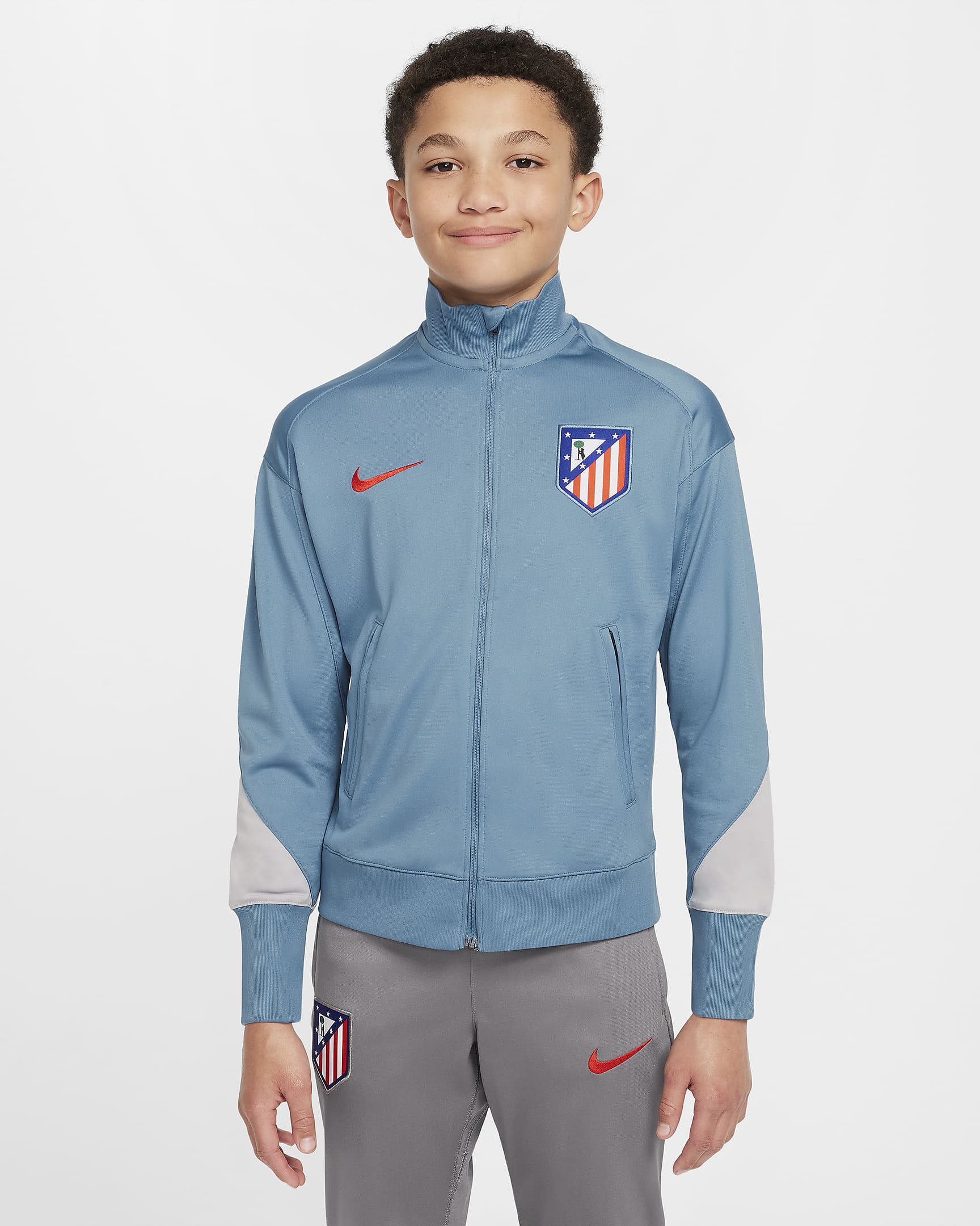 Atlético Madrid Strike Nike Dri-FIT strikket fotballtracksuit til store barn - Noise Aqua/Flat Pewter/Light Iron Ore/Light Crimson