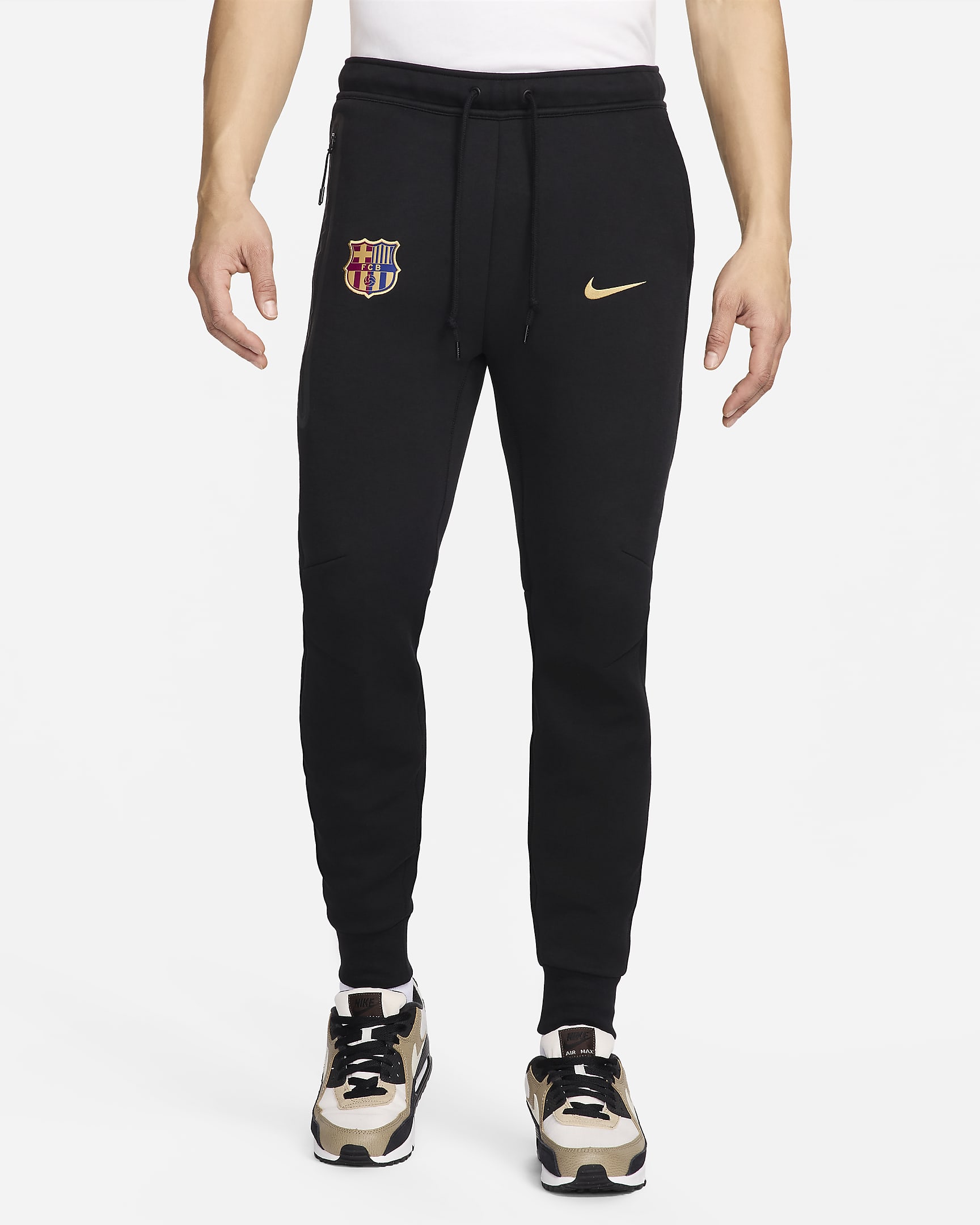 Męskie joggery piłkarskie Nike FC Barcelona Tech Fleece - Czerń/Club Gold