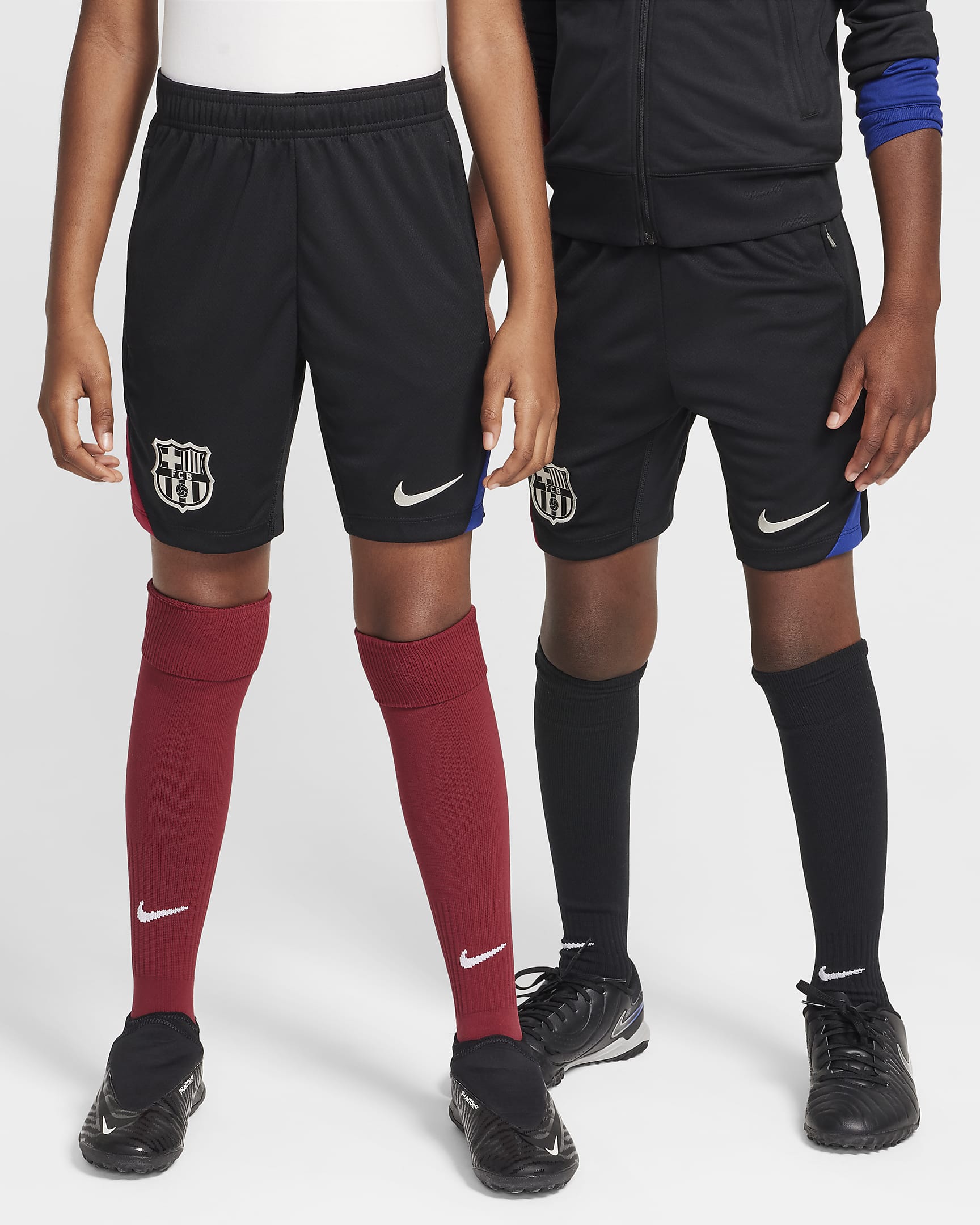 Maskinstrikkede FC Barcelona Strike Nike Dri-FIT-fodboldshorts til større børn - sort/Noble Red/Deep Royal Blue/Light Orewood Brown