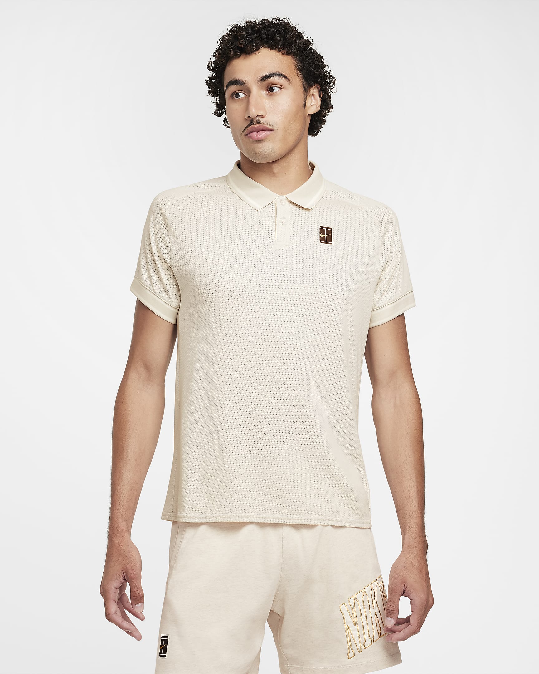 NikeCourt Heritage Men's Tennis Polo - Light Orewood Brown