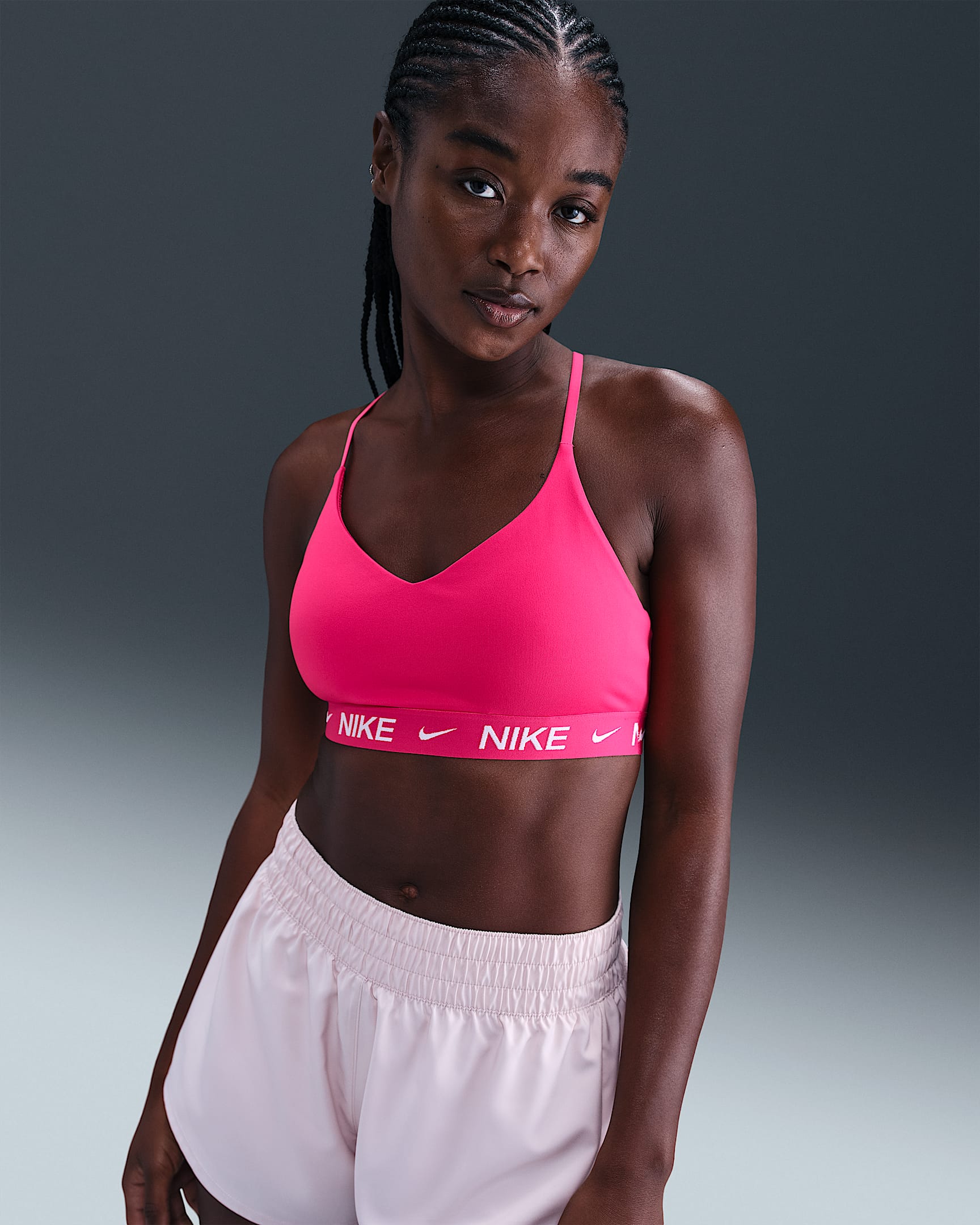 Sutiã de desporto ajustável almofadado de suporte ligeiro Nike Indy para mulher - Rosa Rush