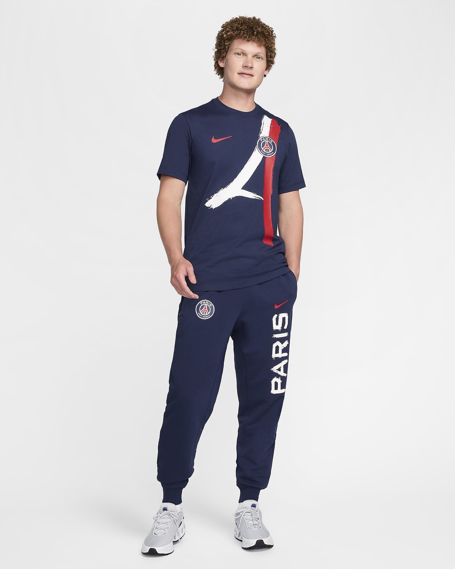 Paris Saint-Germain Standard Issue Men's Nike Dri-FIT Soccer Tapered Pant - Midnight Navy/University Red