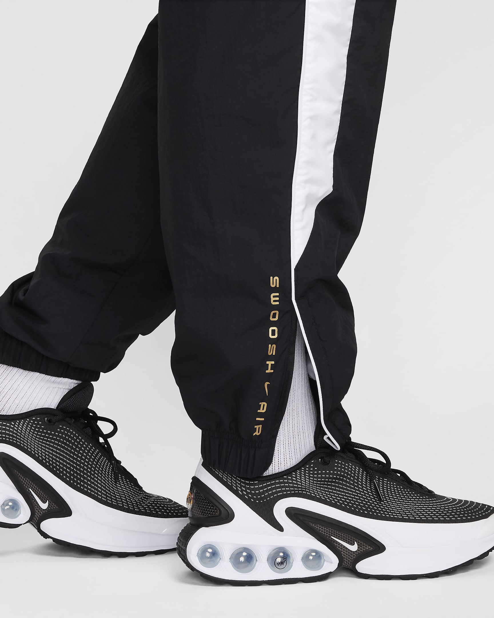 Nike Air Men's Woven Pants - Black/White/Metallic Gold