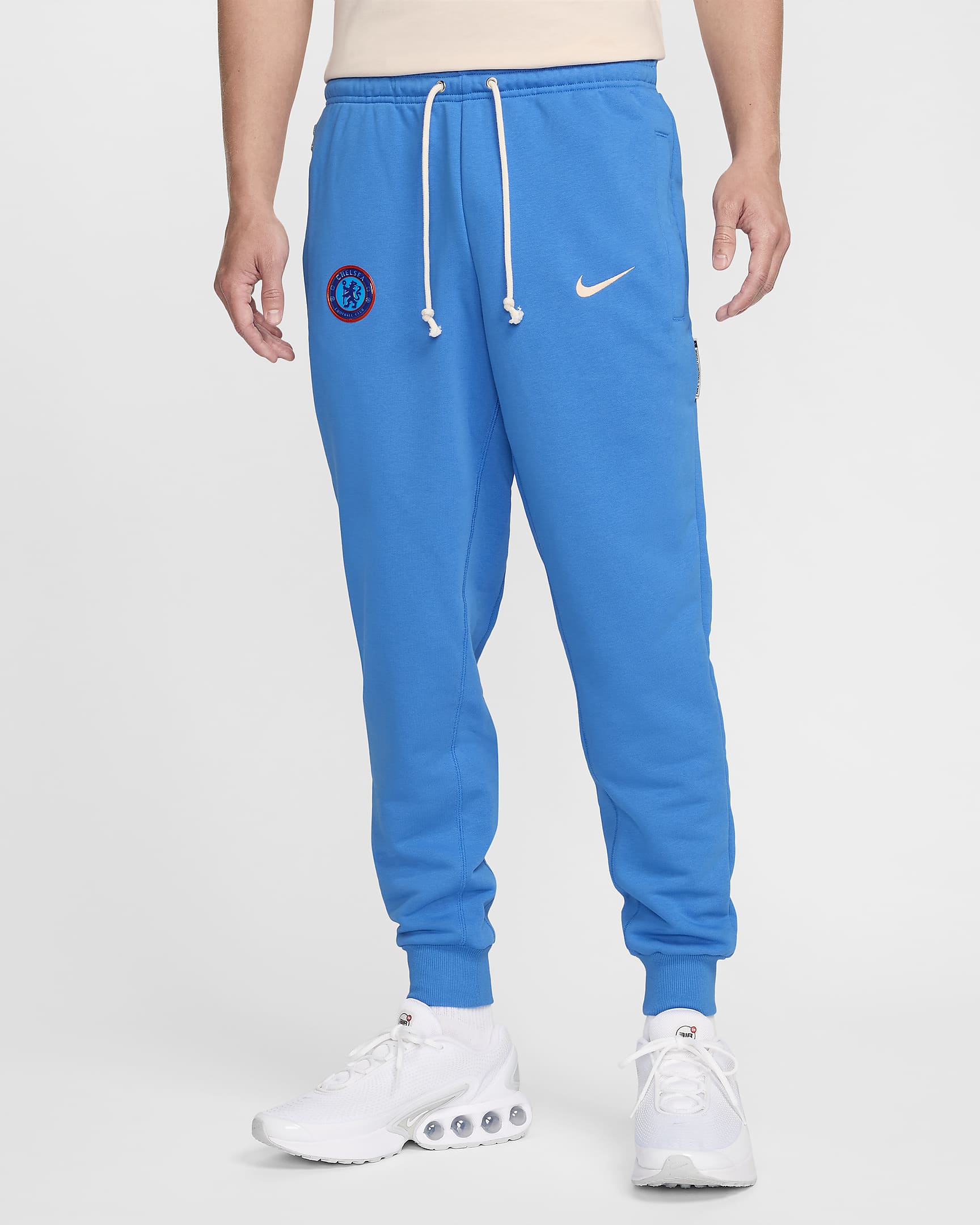 Pantalon de foot fuselé Nike Dri-FIT Chelsea FC Standard Issue pour homme - Light Photo Blue/Guava Ice