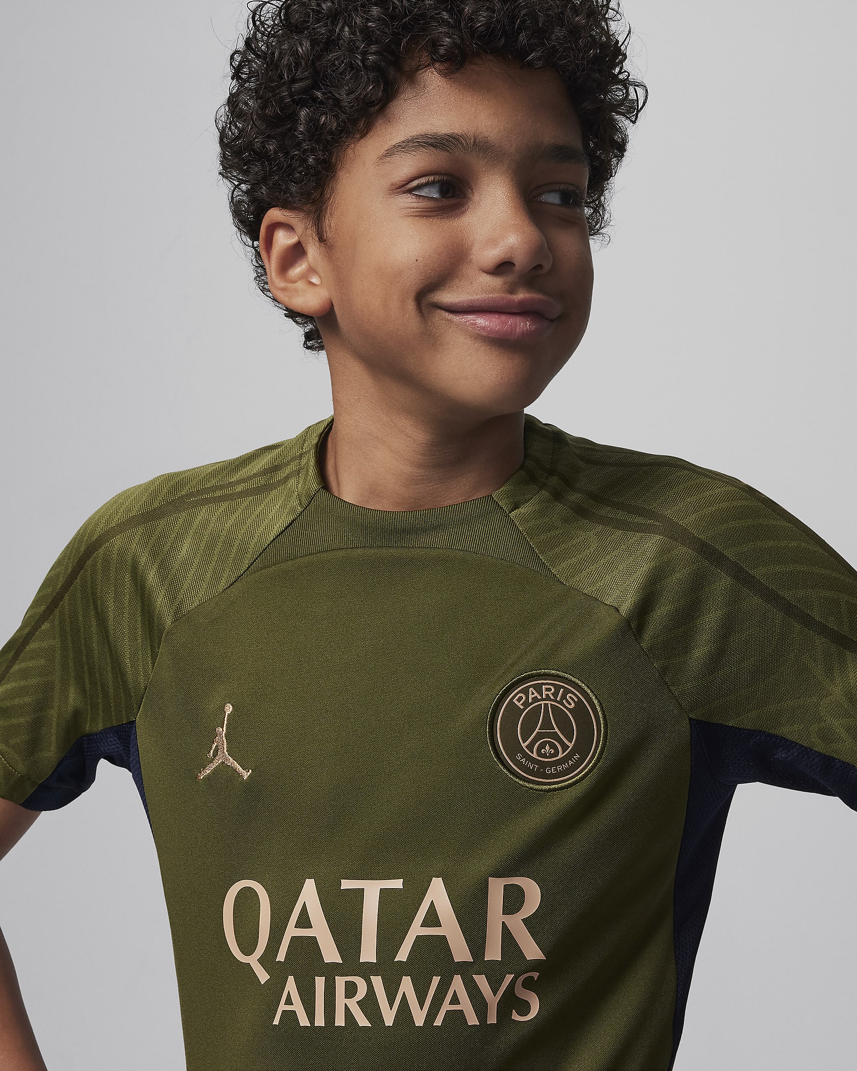 Paris Saint-Germain Strike Fourth Big Kids' Jordan Dri-FIT Soccer Knit Top - Rough Green/Rough Green/Dark Obsidian/Hemp