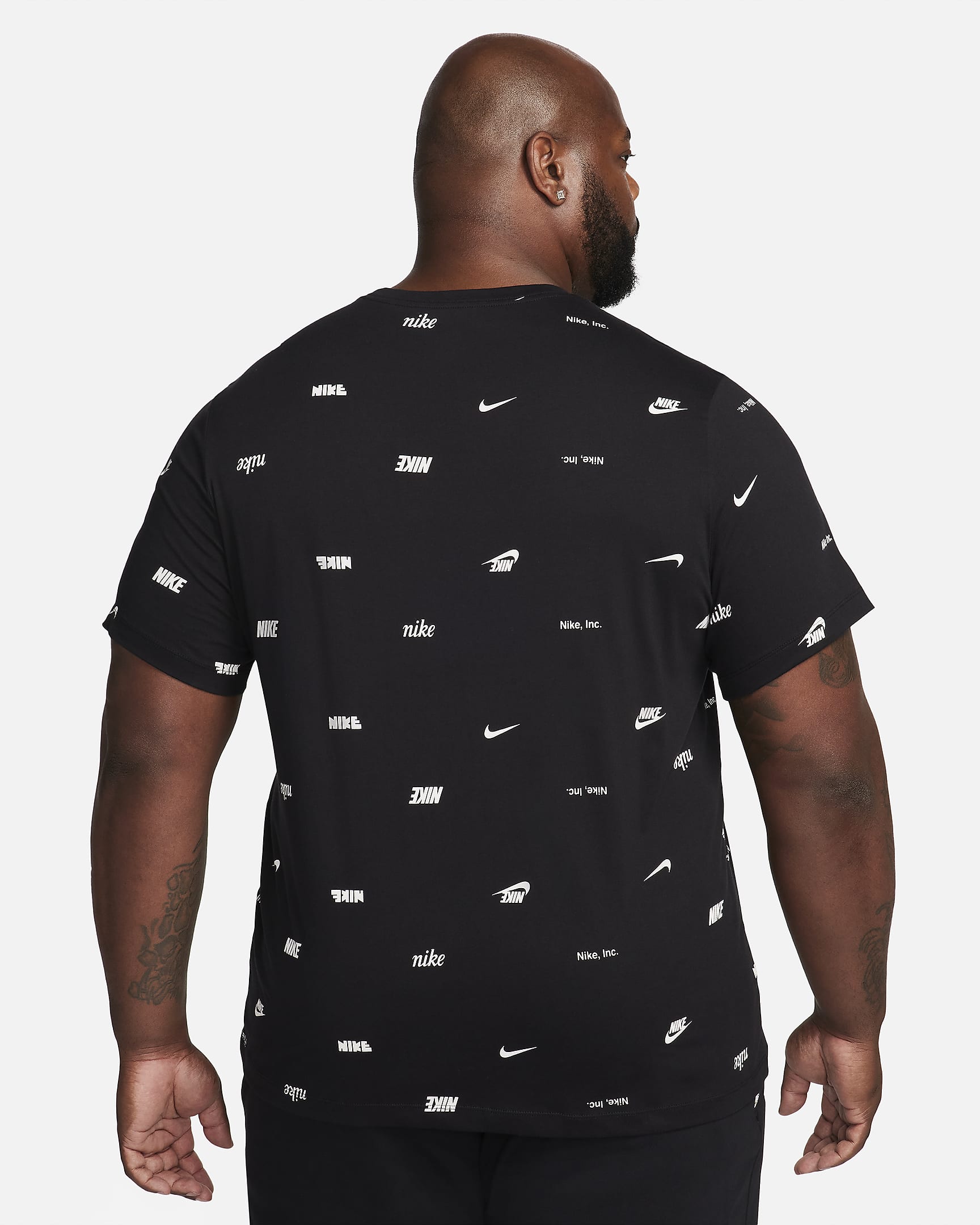 Playera con estampado en toda la prenda para hombre Nike Club - Negro