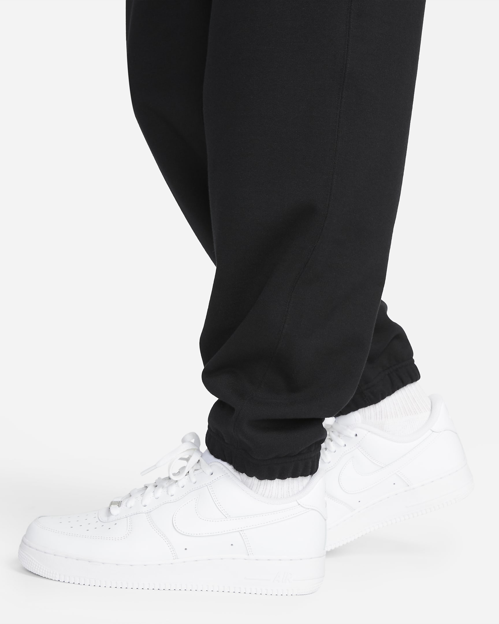 Nike Solo Swoosh Men's French Terry Trousers. Nike HR