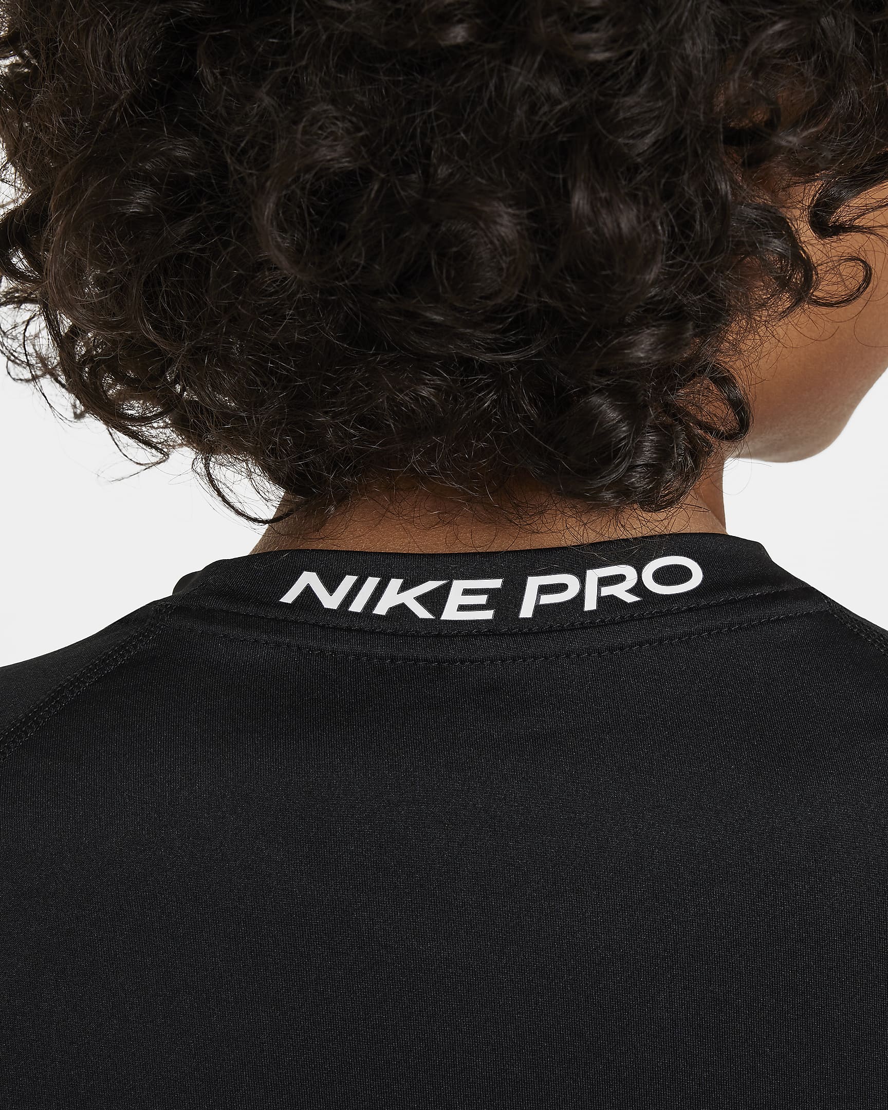 Nike Pro Older Kids' (Boys') Dri-FIT Short-Sleeve Top - Black/White