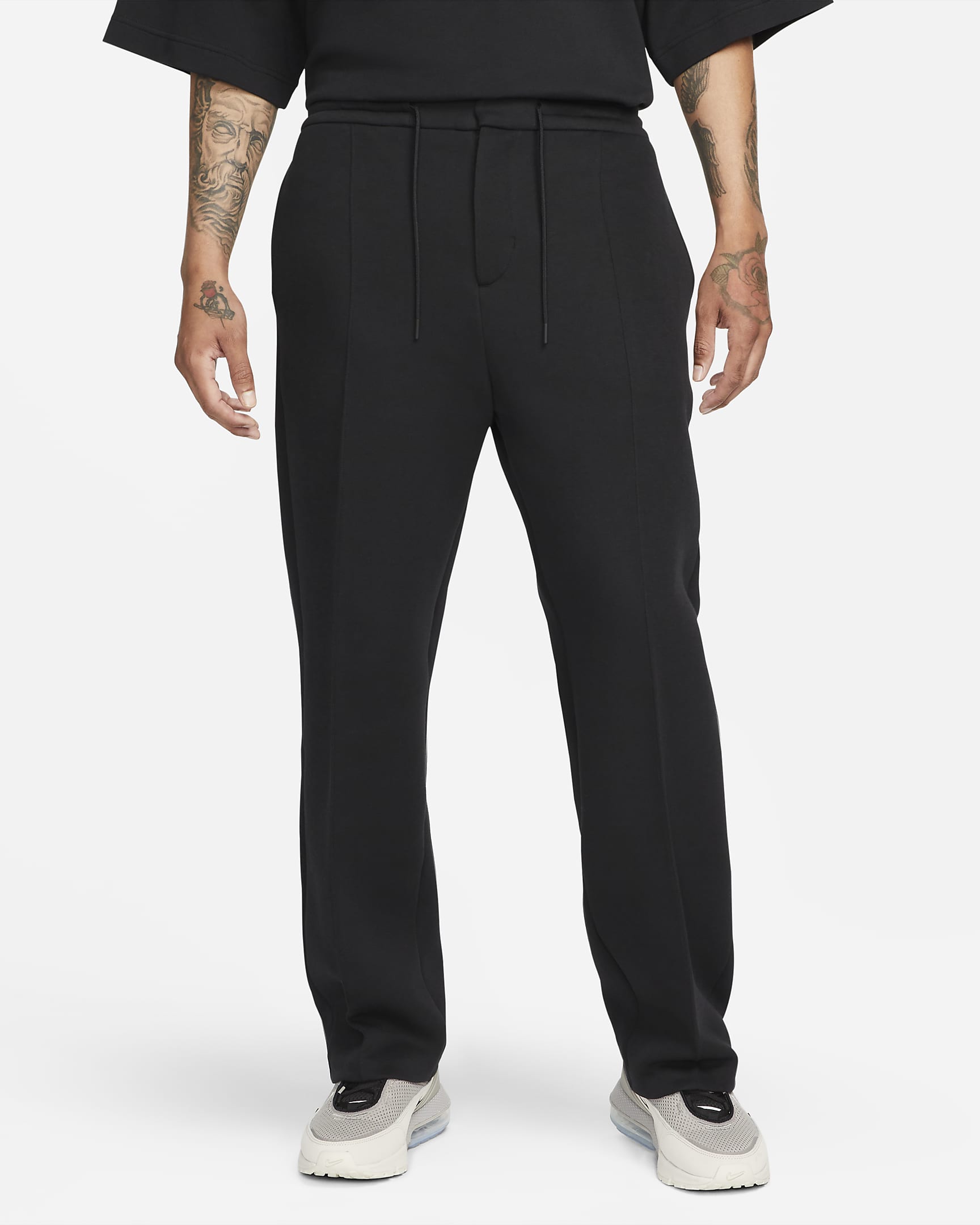 Pantaloni tuta Loose Fit con orlo aperto Nike Sportswear Tech Fleece Reimagined – Uomo - Nero/Nero