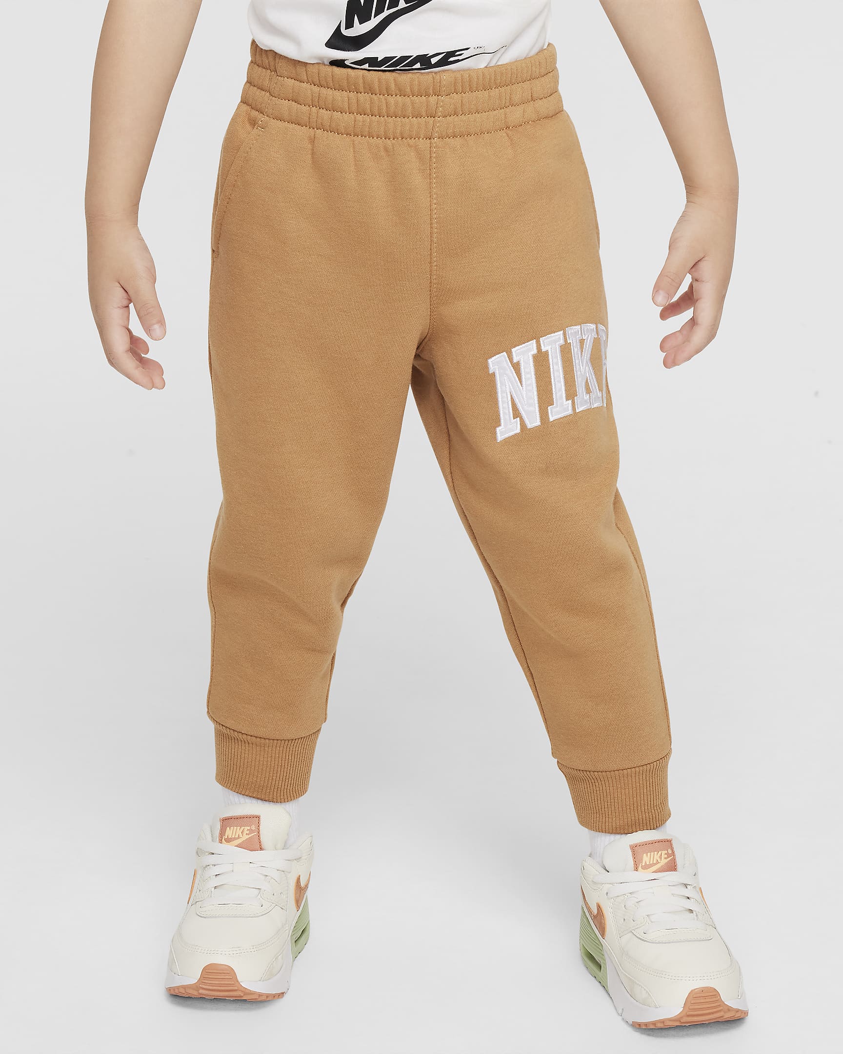 Pants de tejido Fleece con apliques infantil Nike Sportswear Club  - Lino