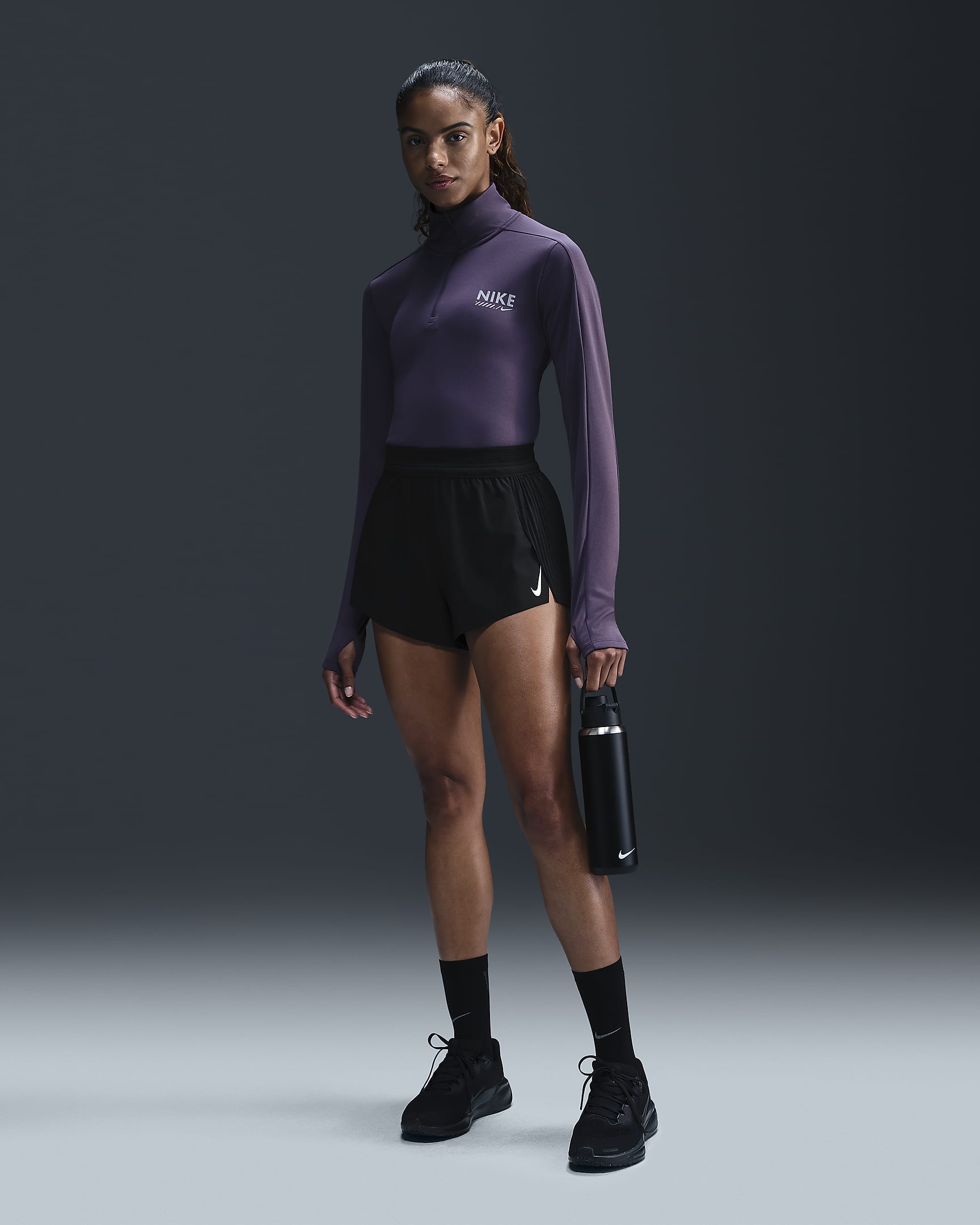 Nike Pacer Dri-FIT-løbetrøje med 1/4 lynlås til kvinder - Dark Raisin