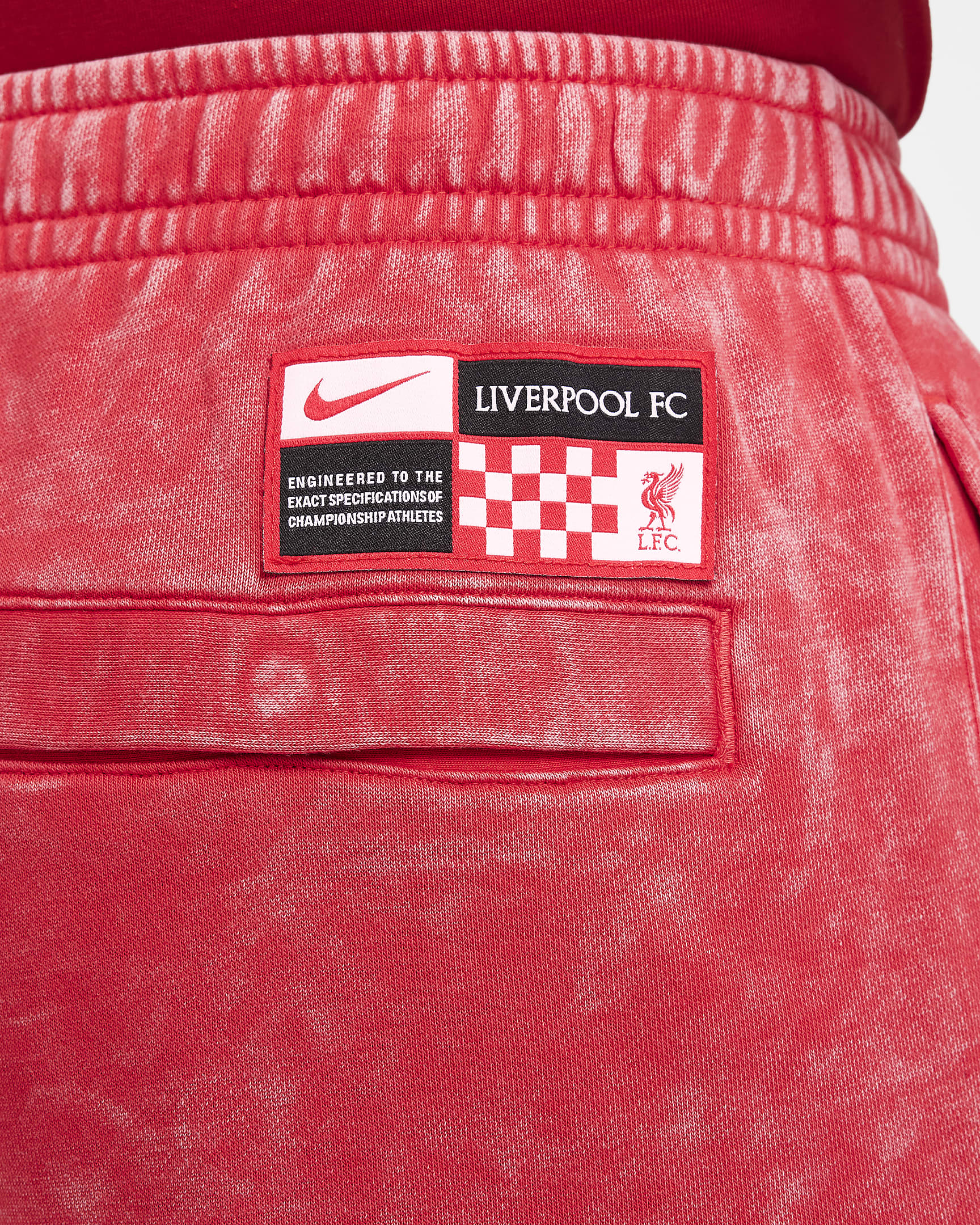 Męskie spodnie piłkarskie Nike Liverpool F.C. Club (wersja trzecia) - University Red/Czerń