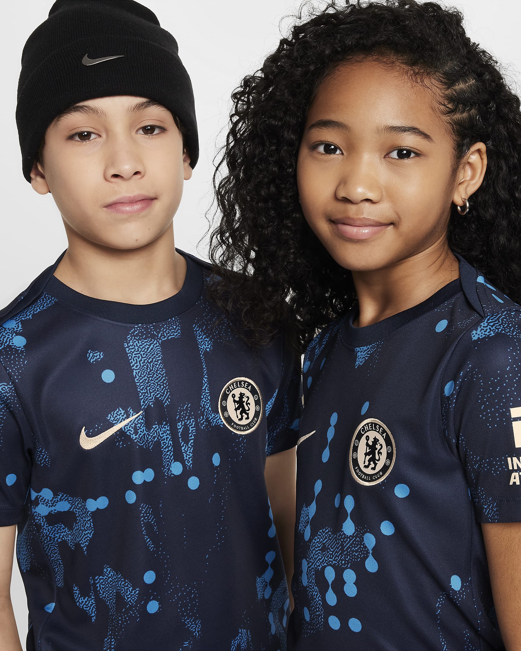 Chelsea FC Academy Pro Big Kids' Nike Dri-FIT Soccer Short-Sleeve Pre-Match Top - Obsidian/Guava Ice