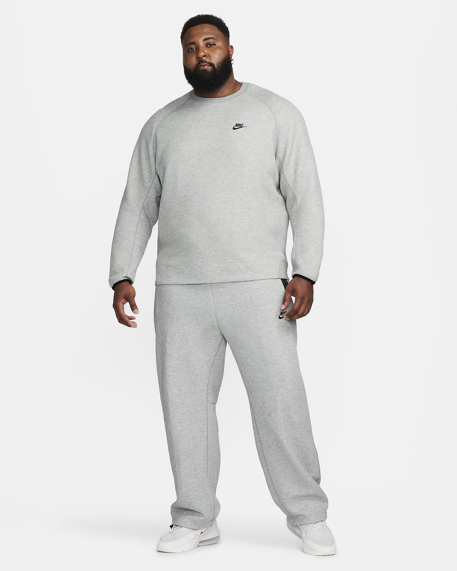 Nike Sportswear Tech Fleece Herren-Trainingshose mit offenem Saum - Dark Grey Heather/Schwarz