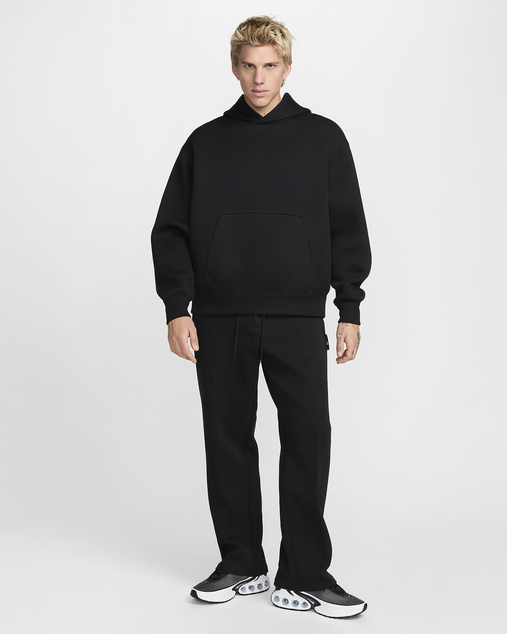 Pantaloni sartoriali in fleece Nike Tech – Uomo - Nero/Nero