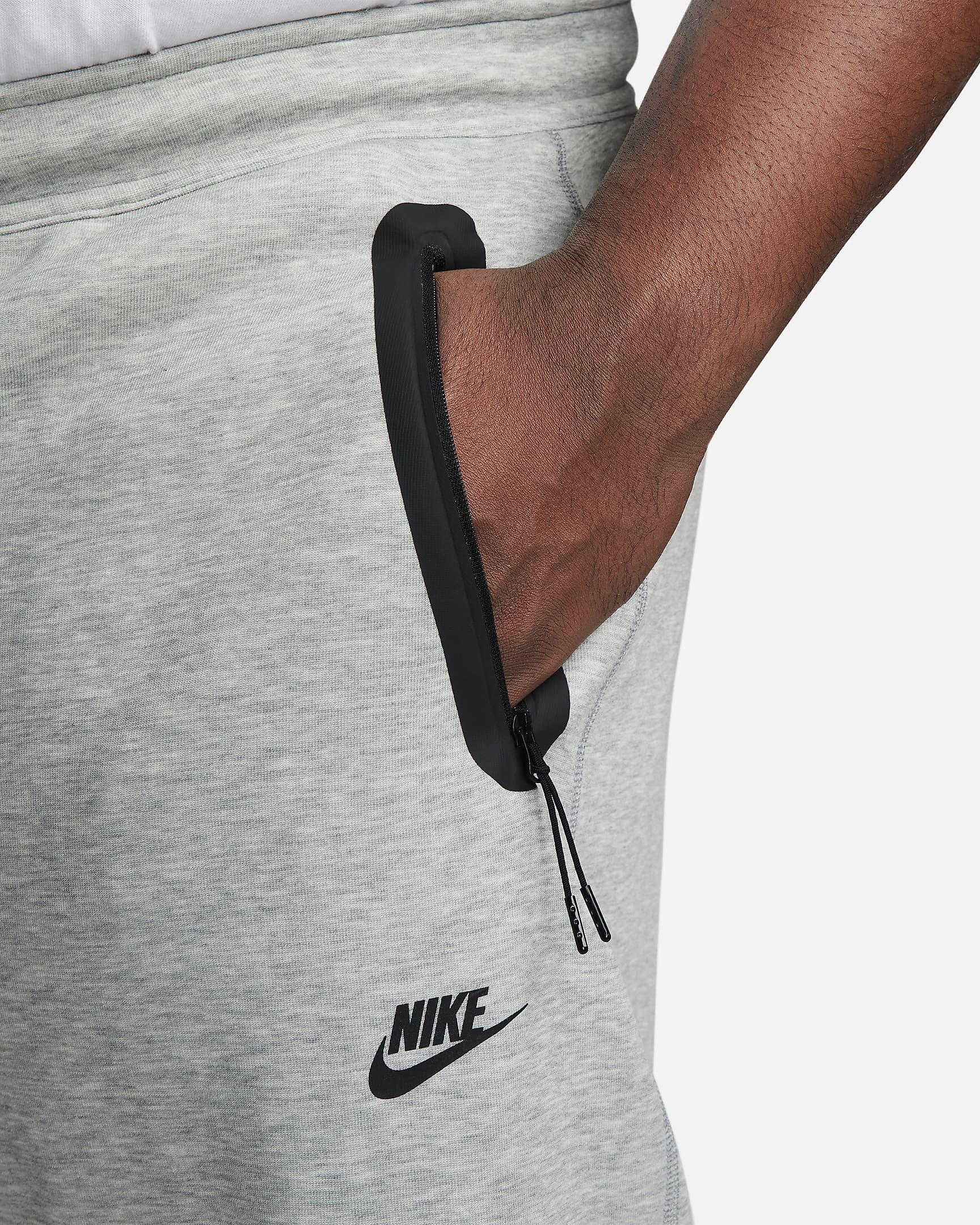 Męskie spodnie dresowe o luźnym kroju u dołu Nike Sportswear Tech Fleece - Dark Grey Heather/Czerń