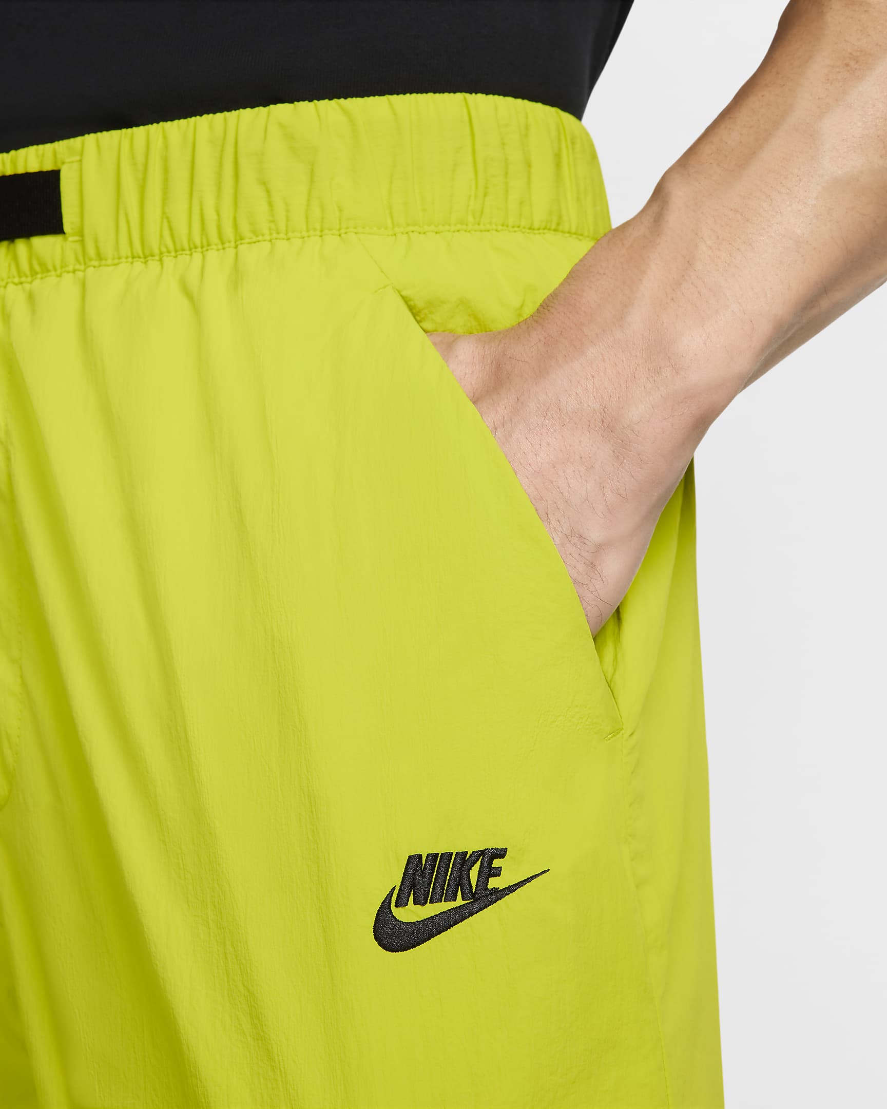 Męskie bojówki z tkaniny Nike Nike Tech - Bright Cactus/Czerń