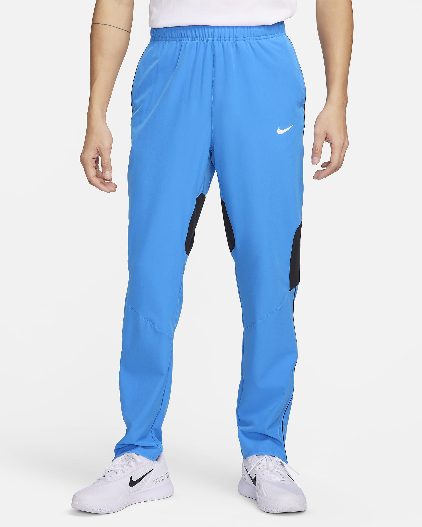 Pantalon de tennis Dri-FIT NikeCourt Advantage pour homme - Light Photo Blue/Noir/Blanc