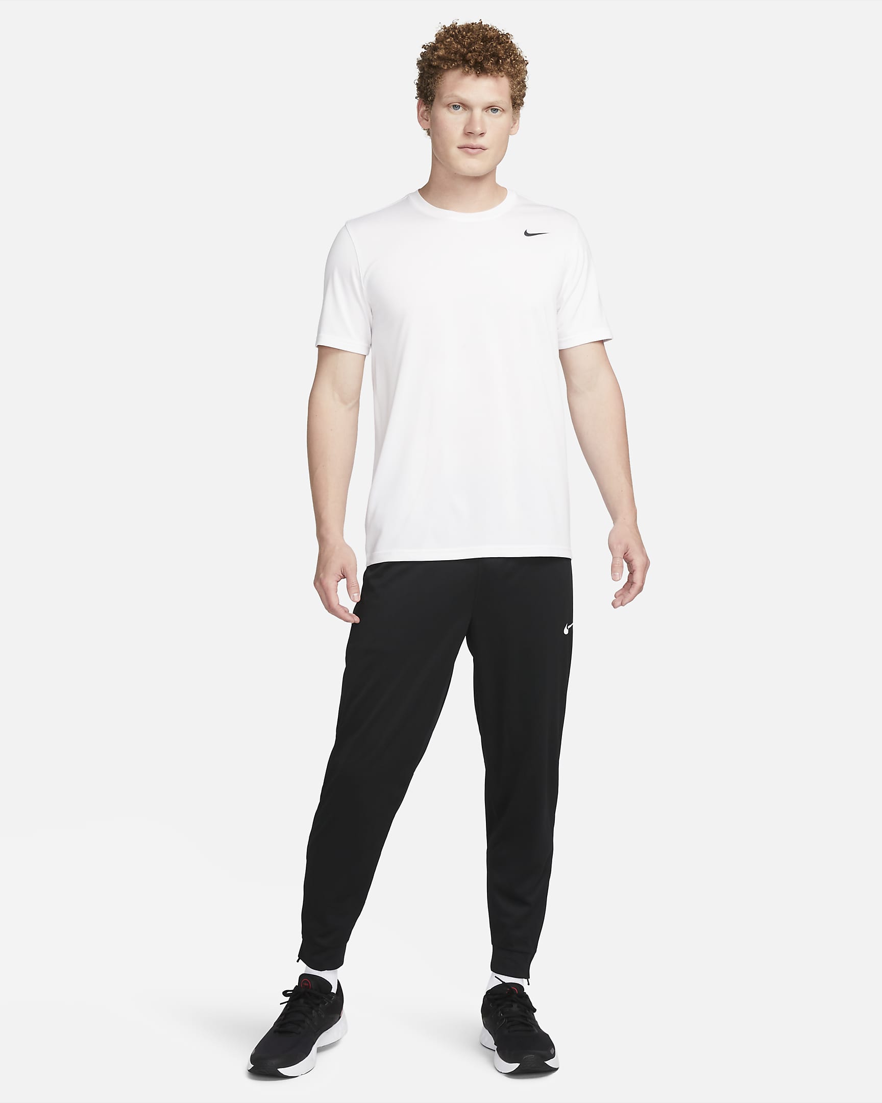 Męskie uniwersalne spodnie ze zwężanymi nogawkami Dri-FIT Nike Totality - Czerń/Biel