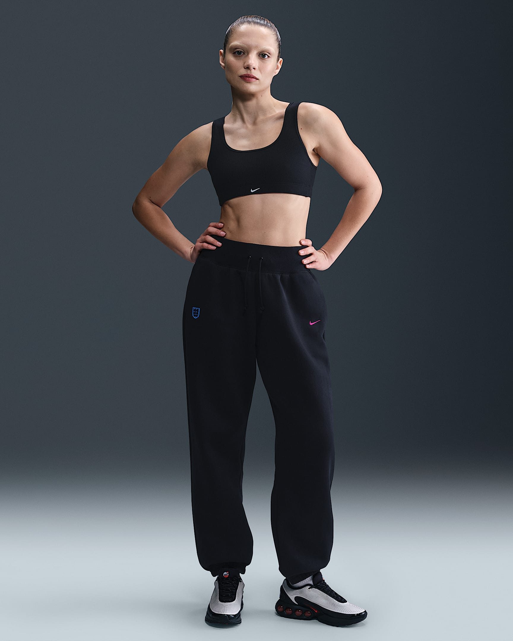 England Phoenix Fleece Women's Nike Football High-Waisted Oversized Pants - Black/Black/Vivid Purple
