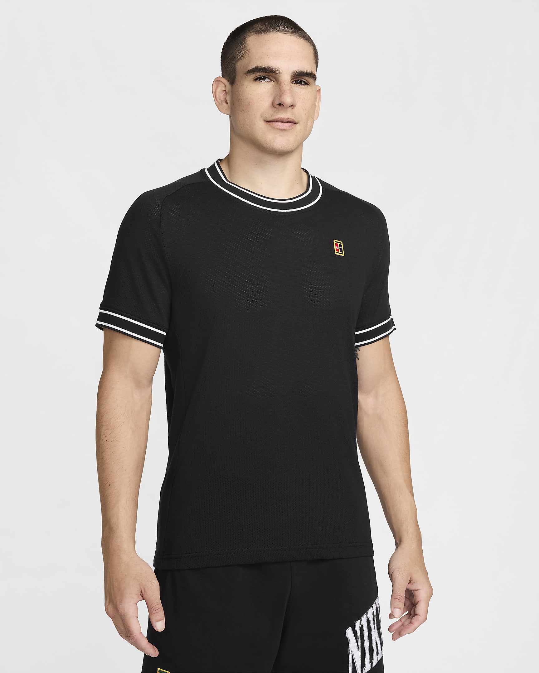 NikeCourt Heritage Kurzarm-Tennisoberteil für Herren - Schwarz