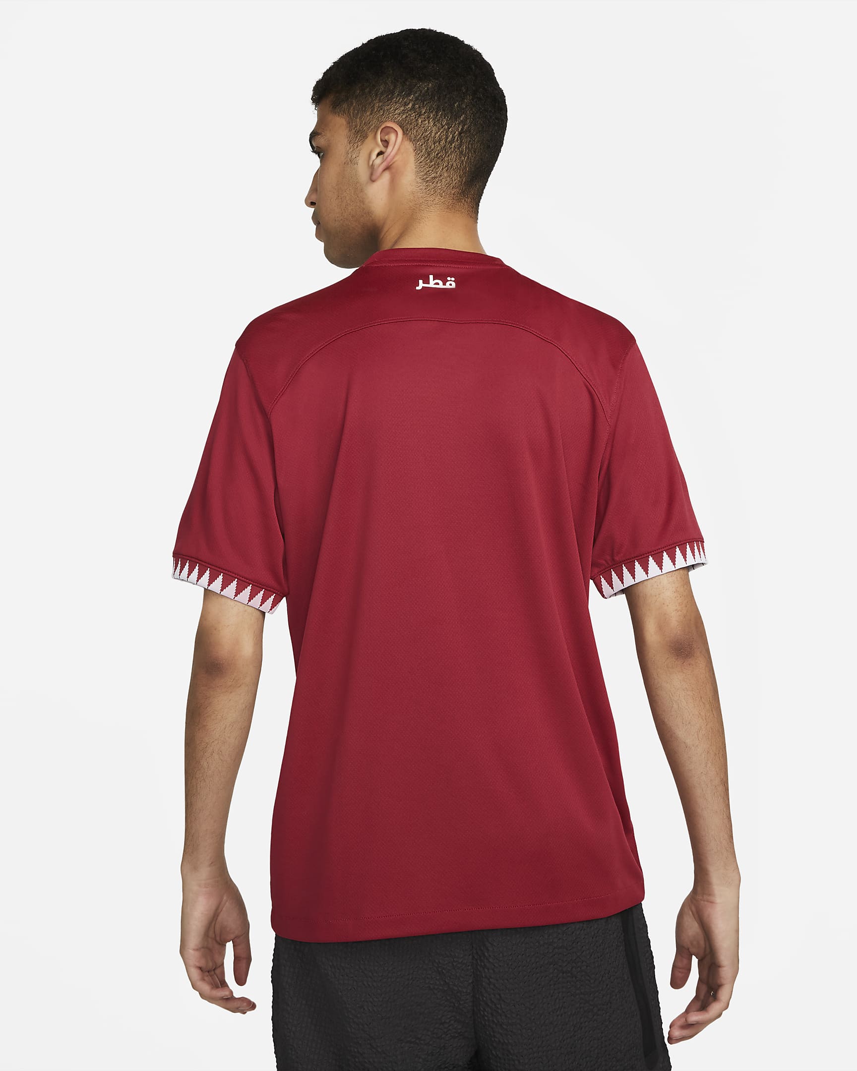 Qatar 2022/23 Stadium Home Men's Nike DriFIT Football Shirt. Nike SE