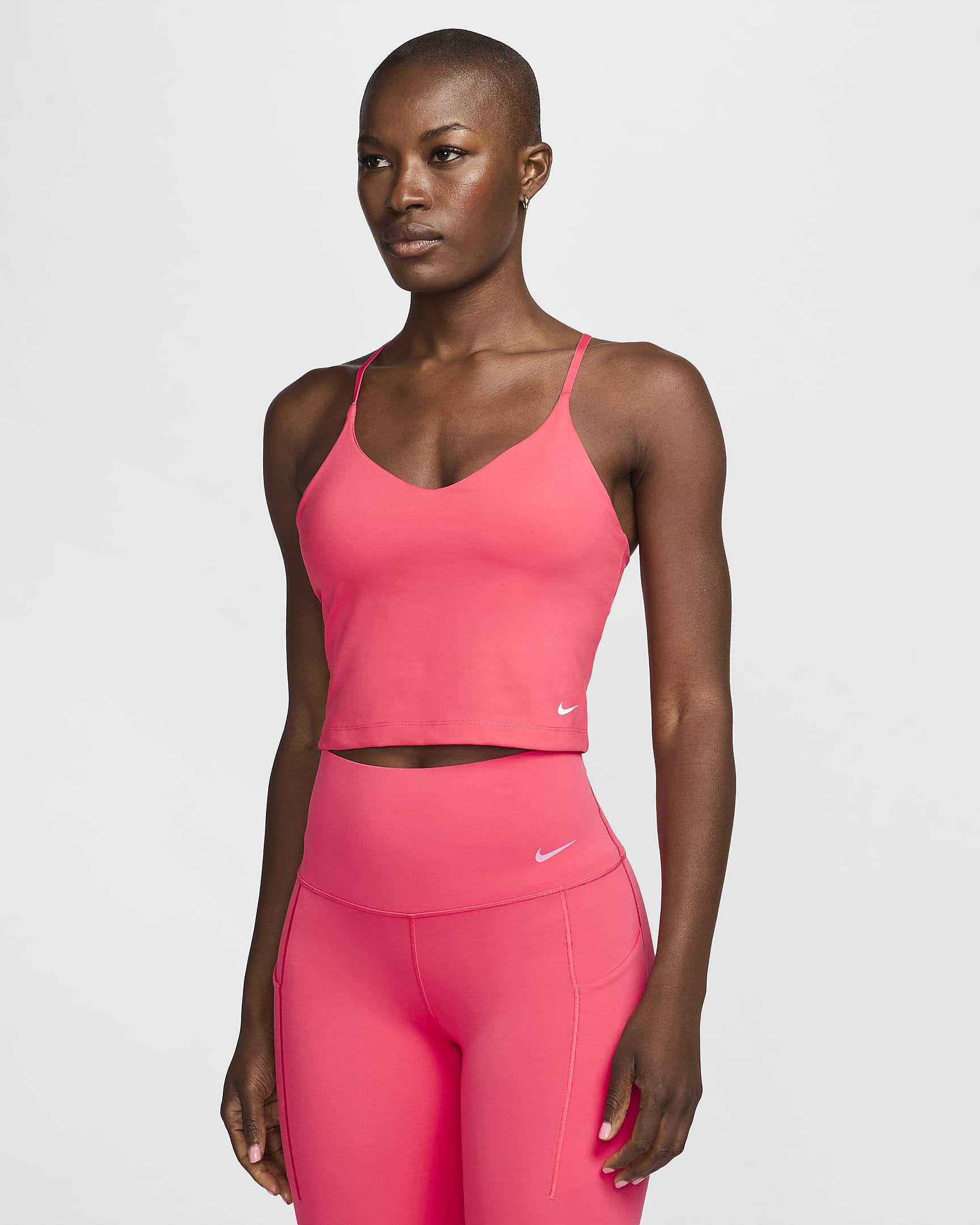 Camiseta de tirantes con bra deportivo con almohadillas de baja sujeción para mujer Nike Indy - Rosa margarita/Blanco