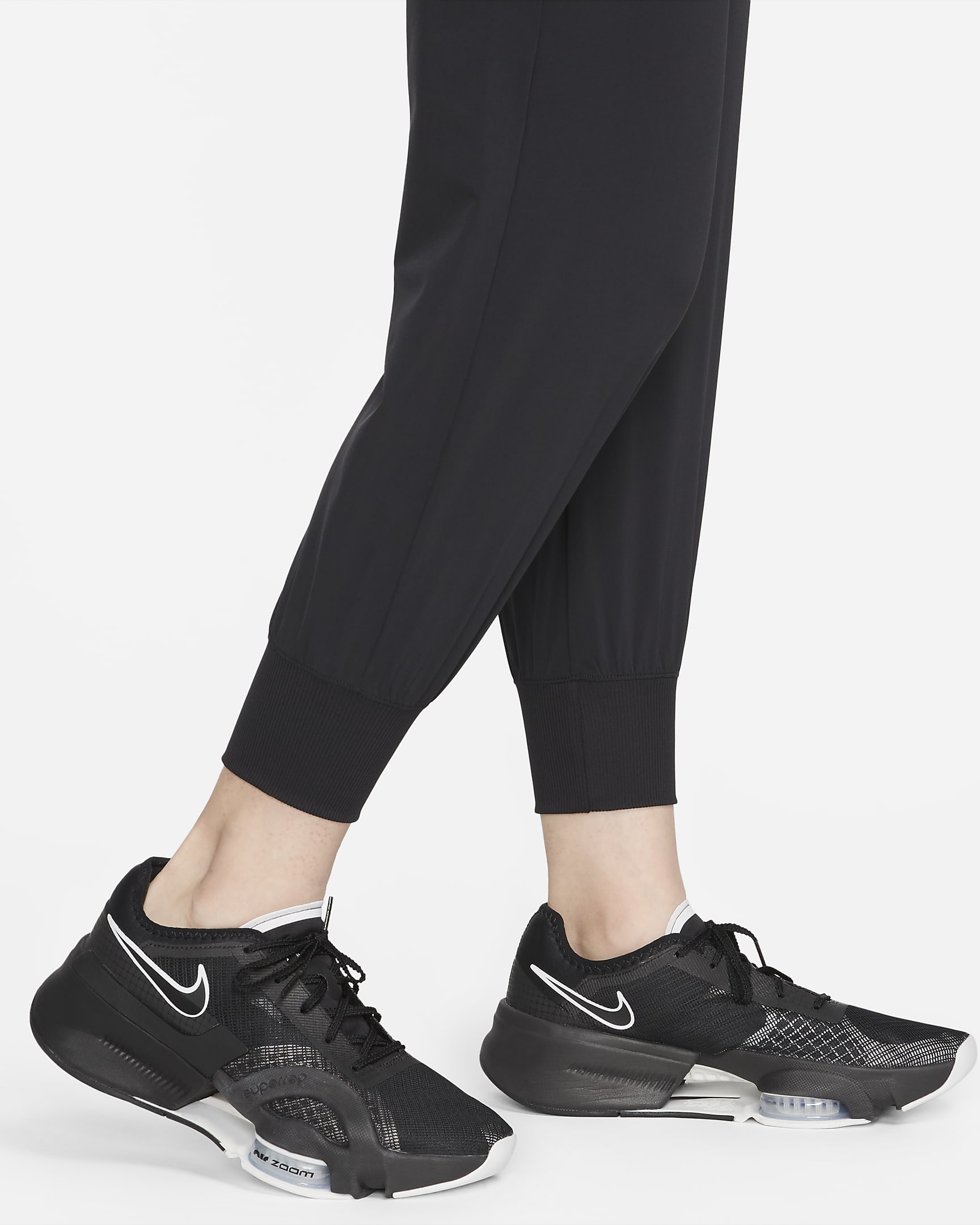 Nike Dri-FIT Bliss Women's Mid-Rise 7/8 Joggers - Black/Clear