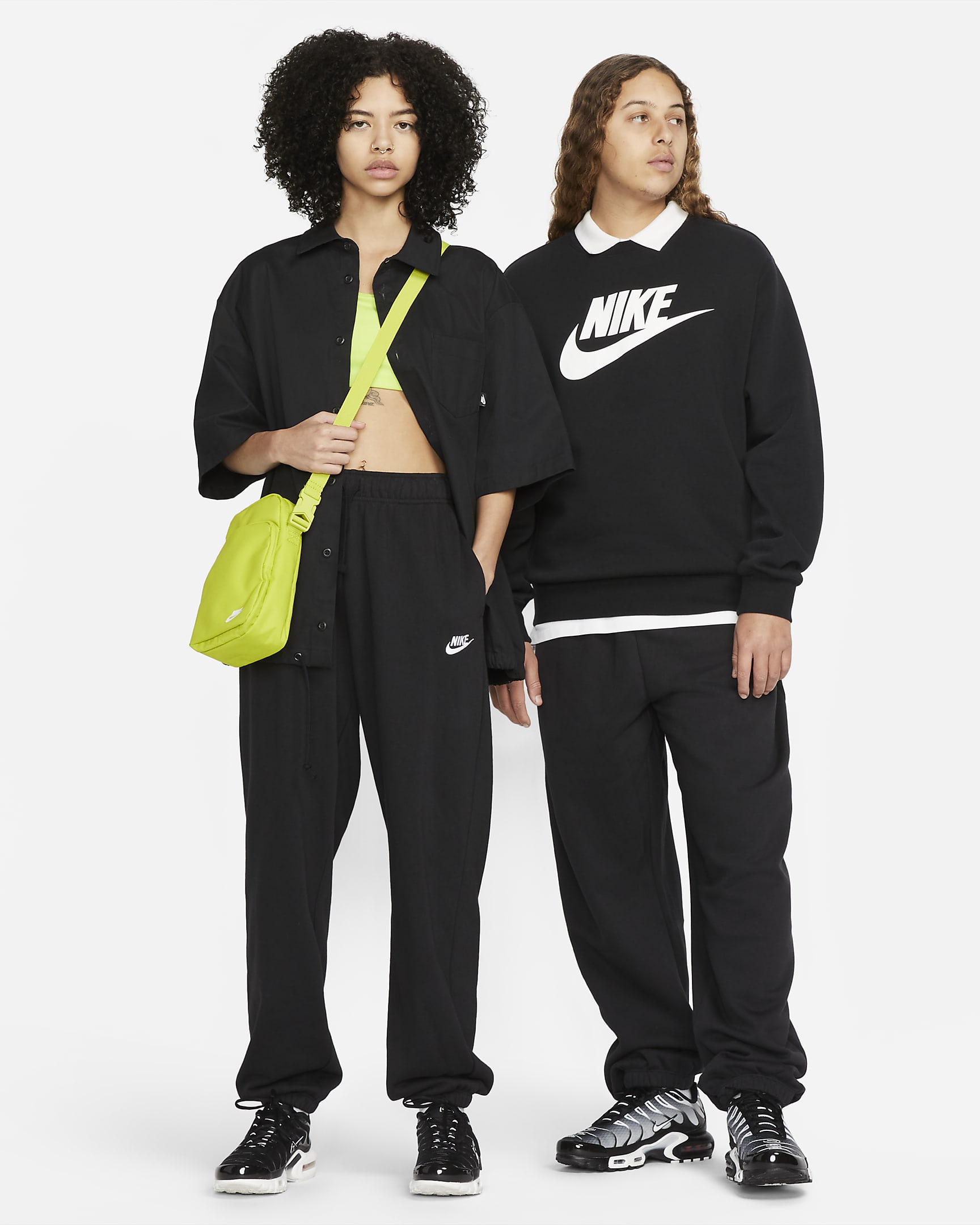 Pants de entrenamiento oversized de tiro medio para mujer Nike Sportswear Club Fleece - Negro/Blanco