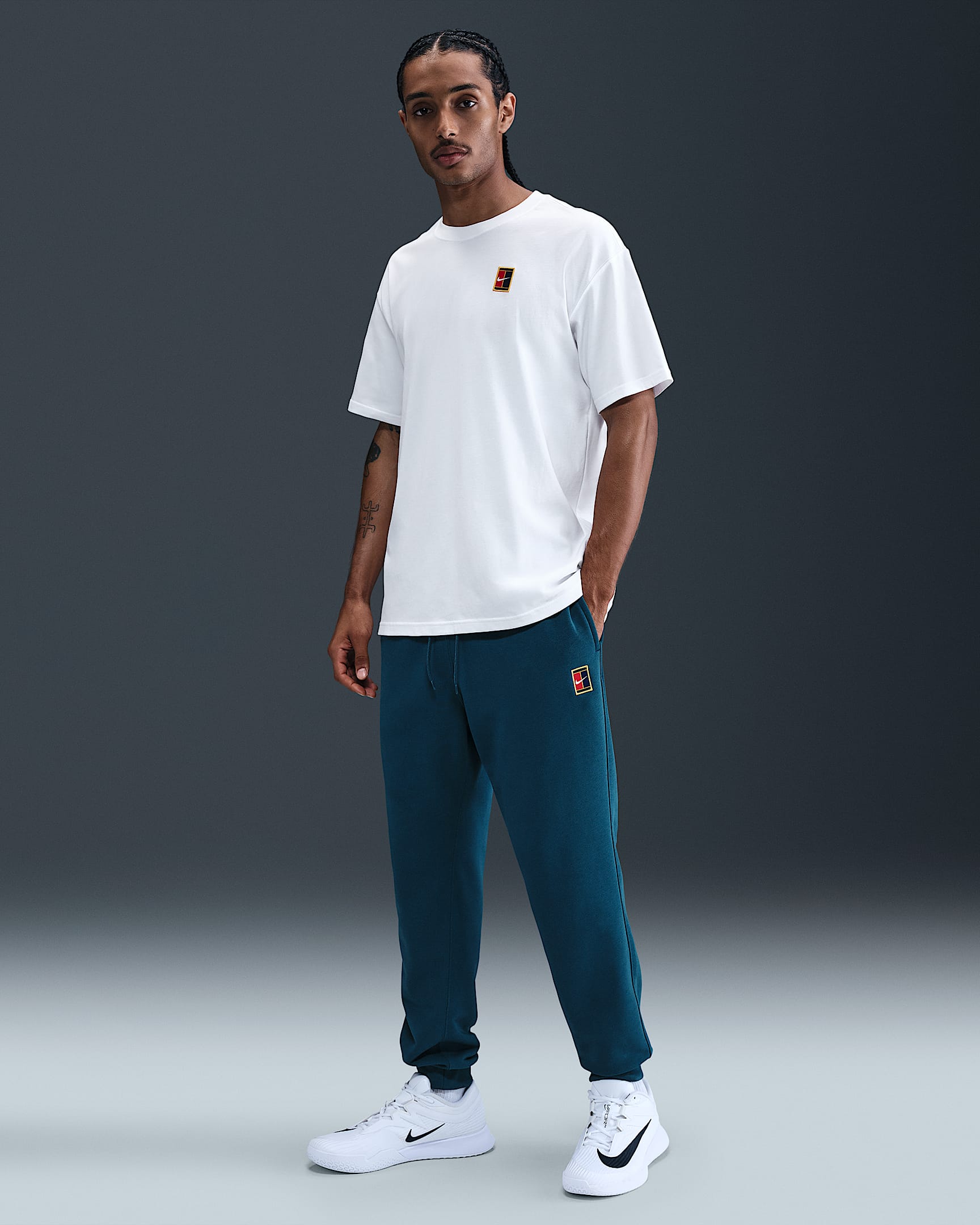 Męskie dzianinowe joggery do tenisa Dri-FIT NikeCourt Heritage - Blue Force