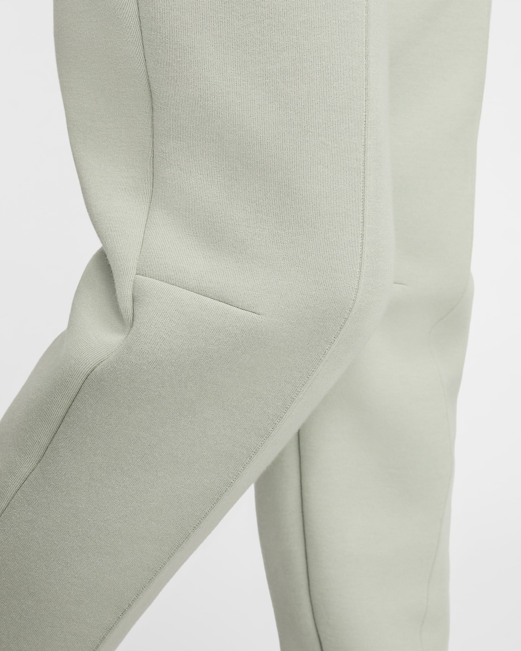 Nike Sportswear Tech Fleece joggebukse med mellomhøyt liv til dame - Jade Horizon/Svart