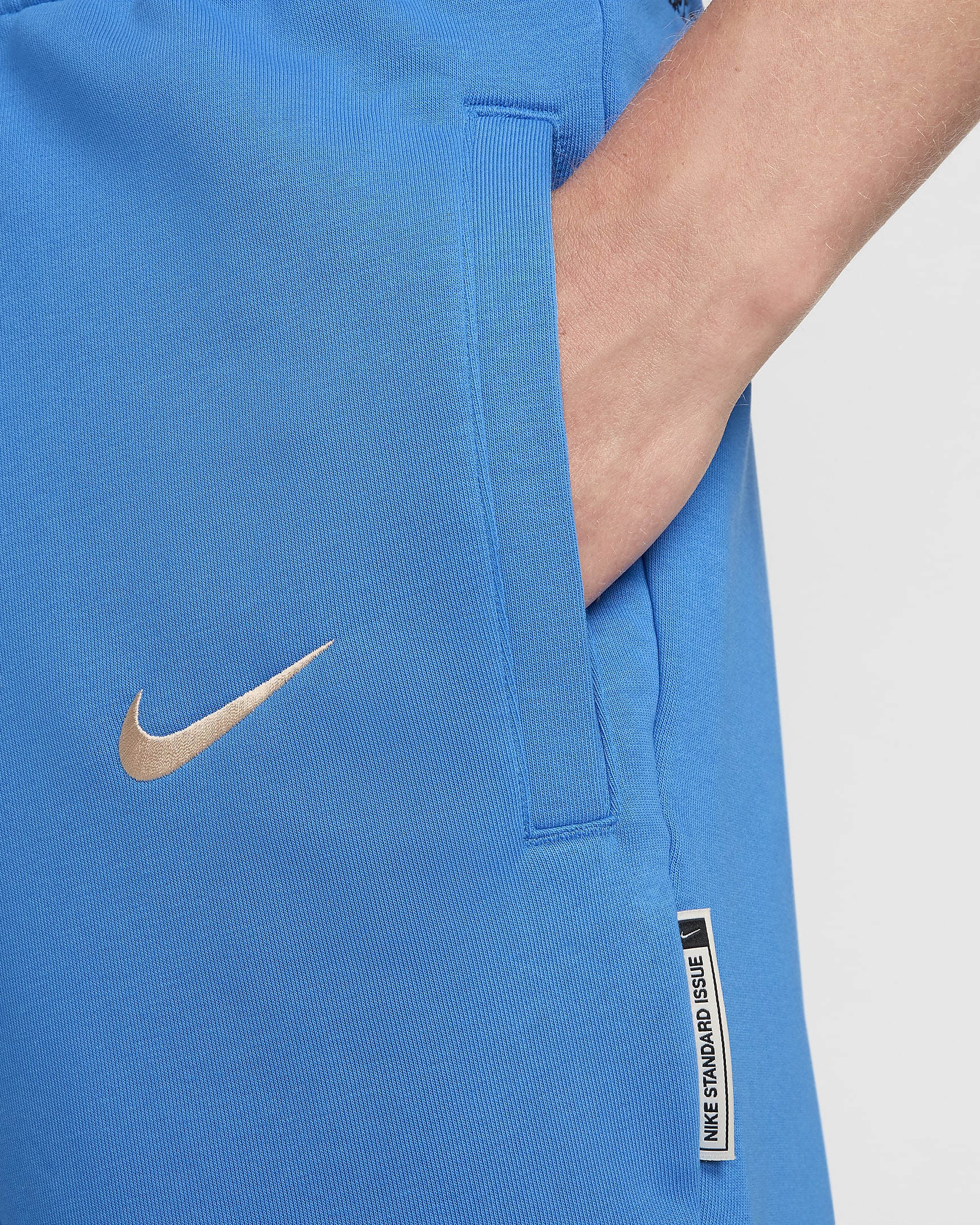 Chelsea F.C. Standard Issue Men's Nike Dri-FIT Football Tapered Pant - Light Photo Blue/Guava Ice