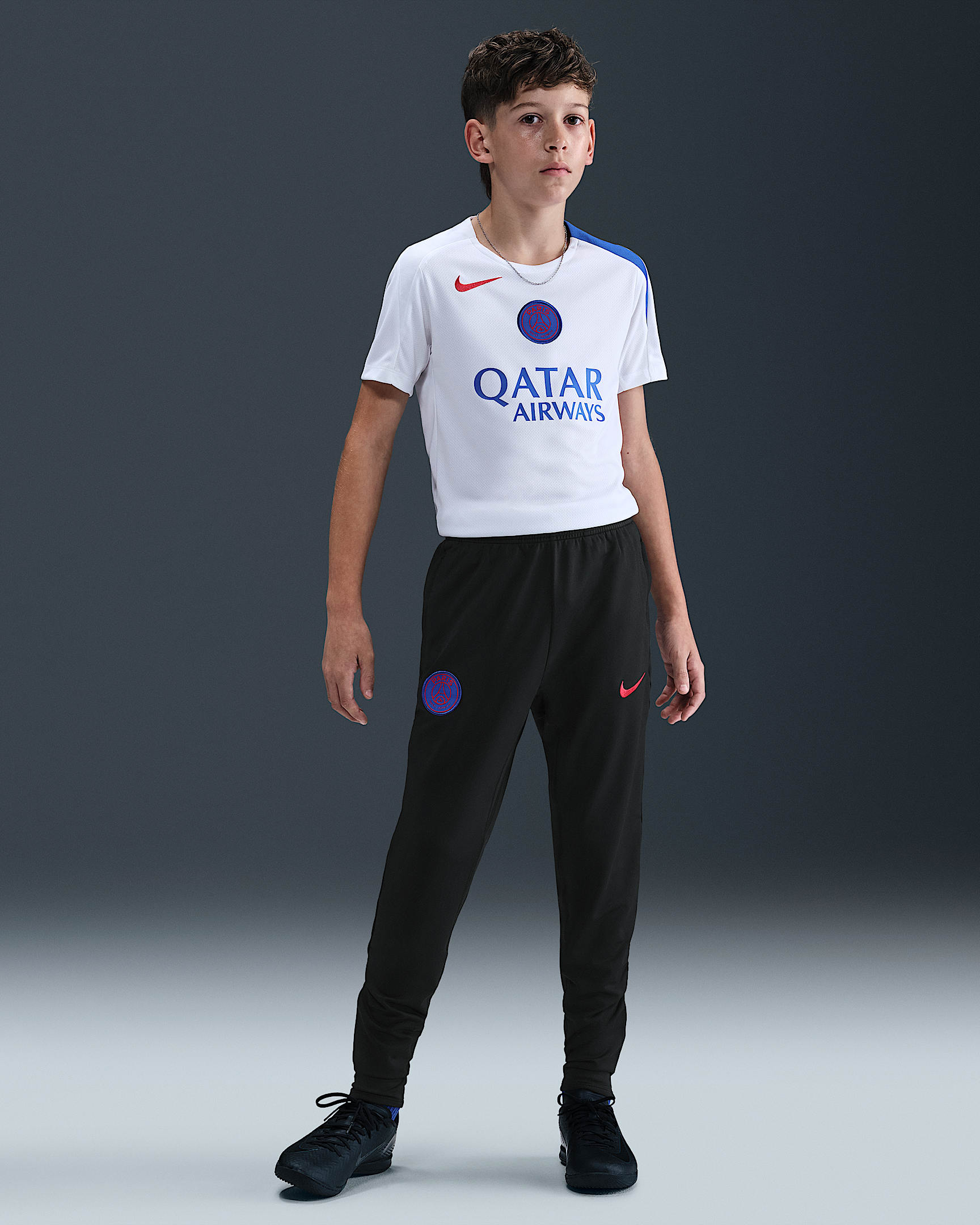 Pantalon de foot en maille Nike Dri-FIT Total 90 Paris Saint-Germain Strike 3e tenue pour ado - Noir/Hyper Royal/Global Red
