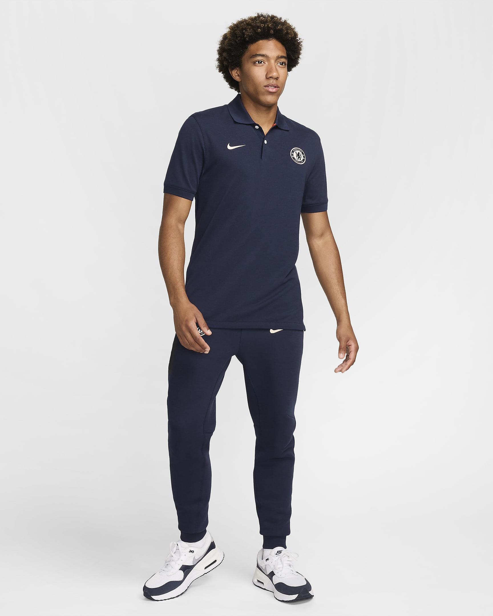 FC Chelsea The Nike Polo Nike Dri-FIT Fußball-Poloshirt (Herren) - Obsidian/Guava Ice