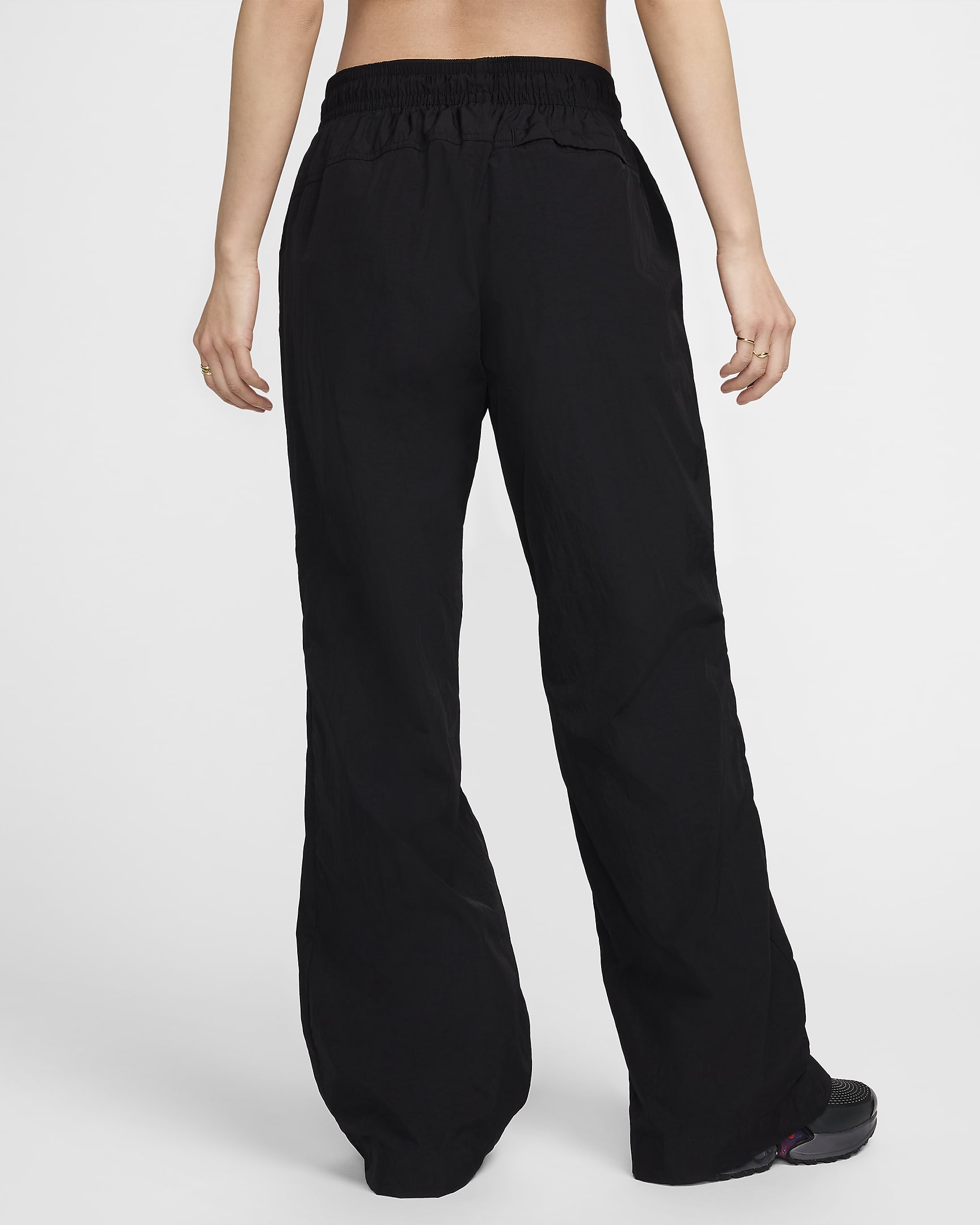 Pantalon à zip taille mi-haute déperlant Nike Sportswear Collection pour femme - Noir/Blanc