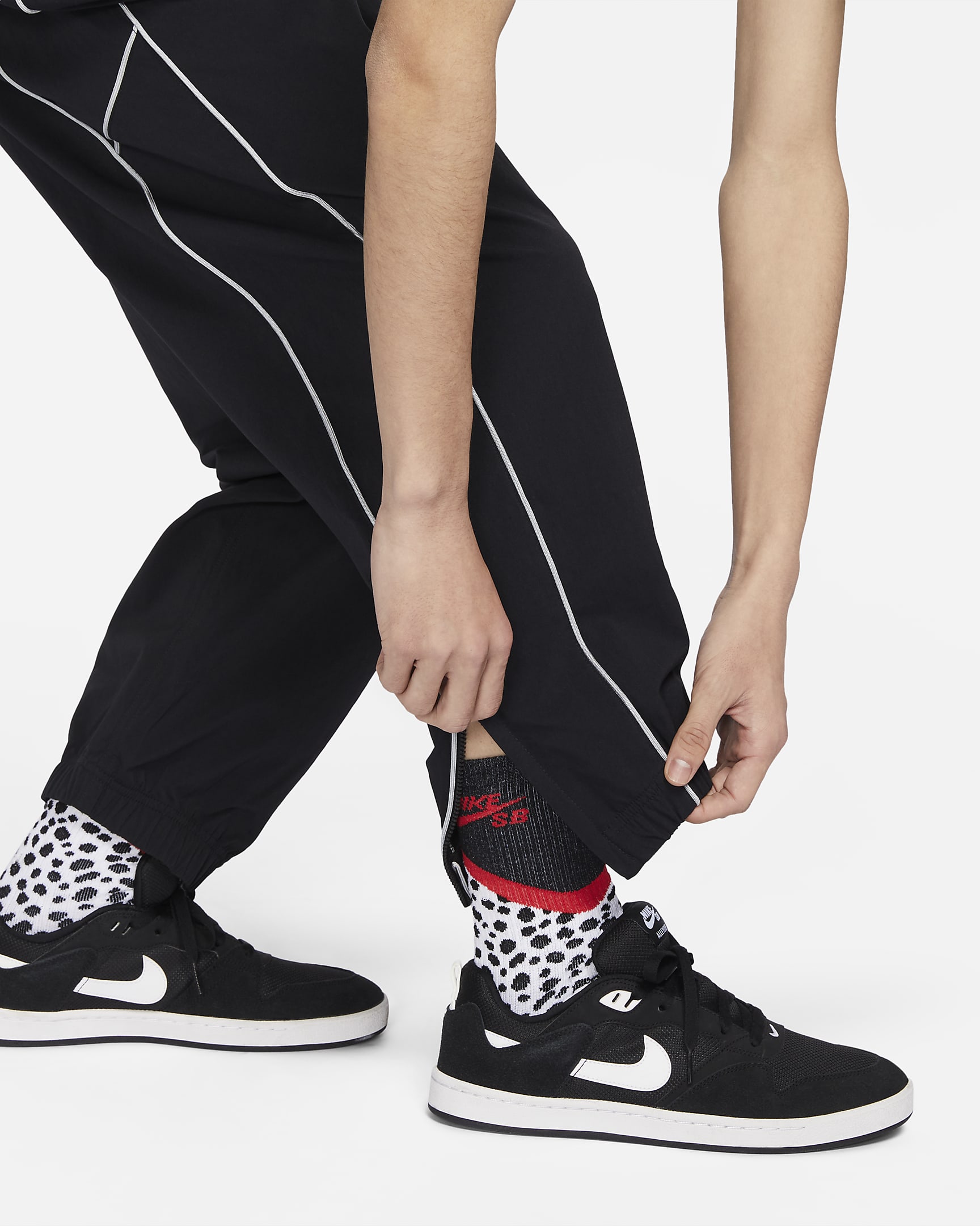 nike stripe tracksuit bottoms