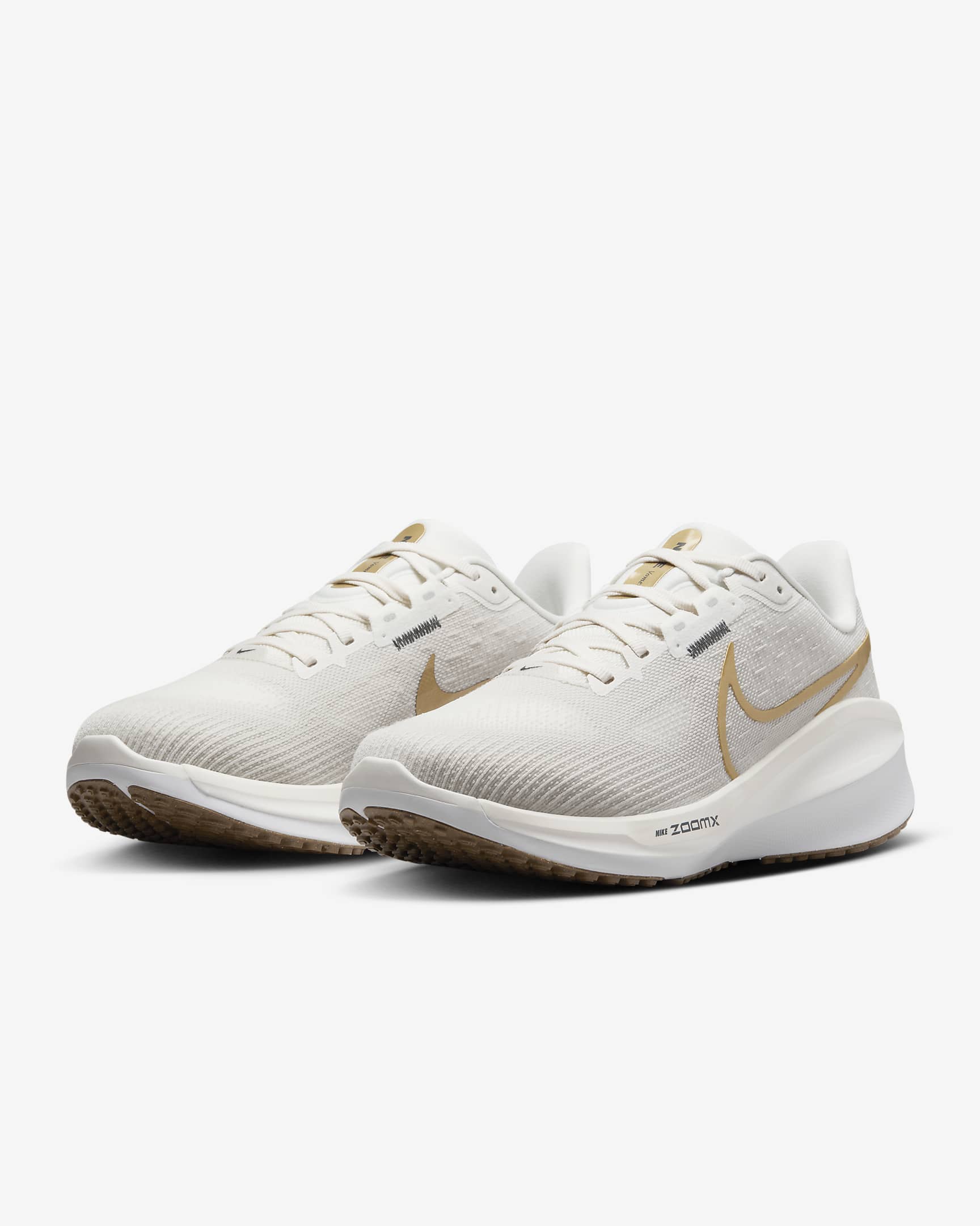 Nike Vomero 17-løbesko til vej til kvinder - Phantom/Light Bone/Sail/Metallic Gold