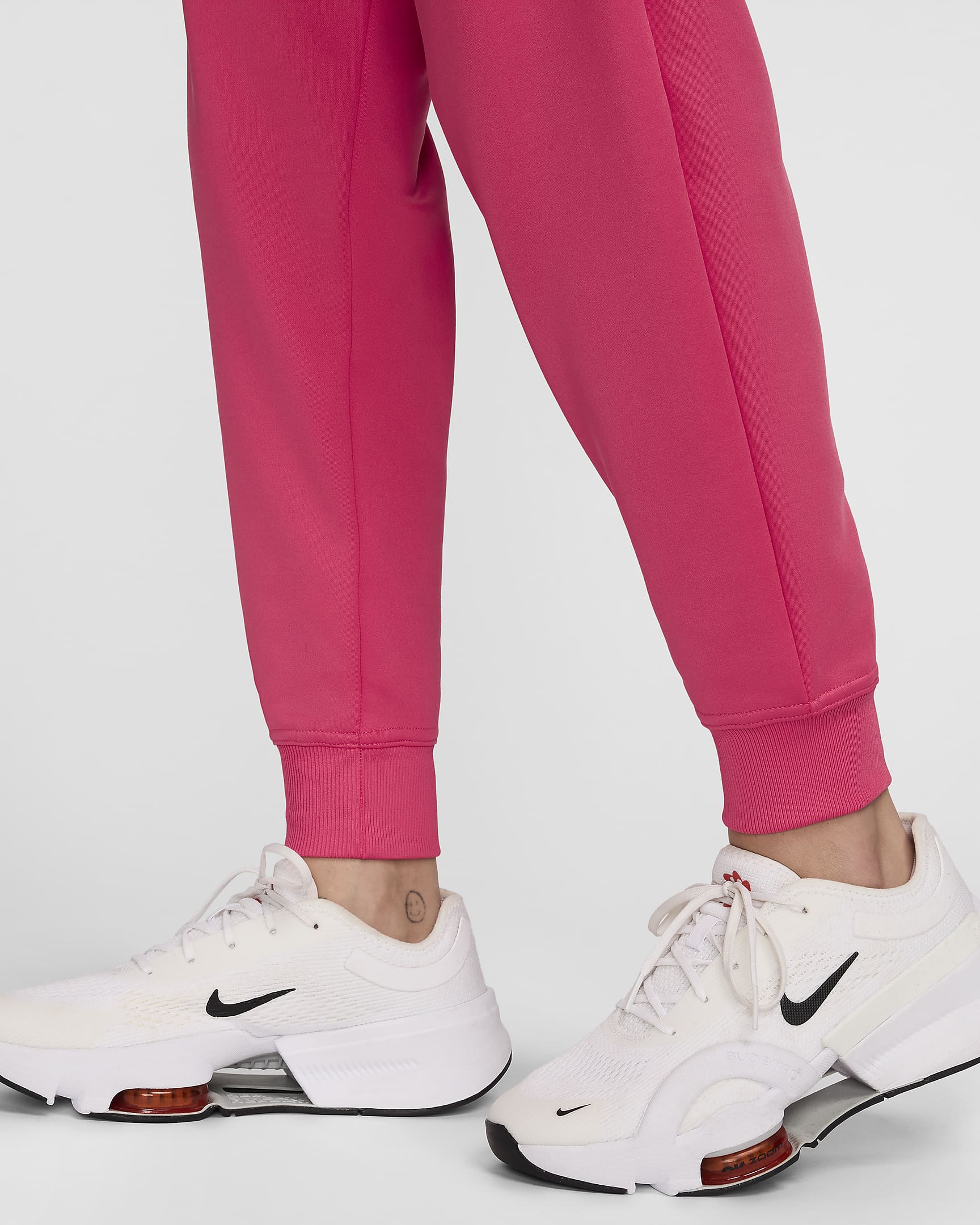 Joggers de tiro alto de 7/8 para mujer Nike Therma-FIT One - Rosa margarita/Negro