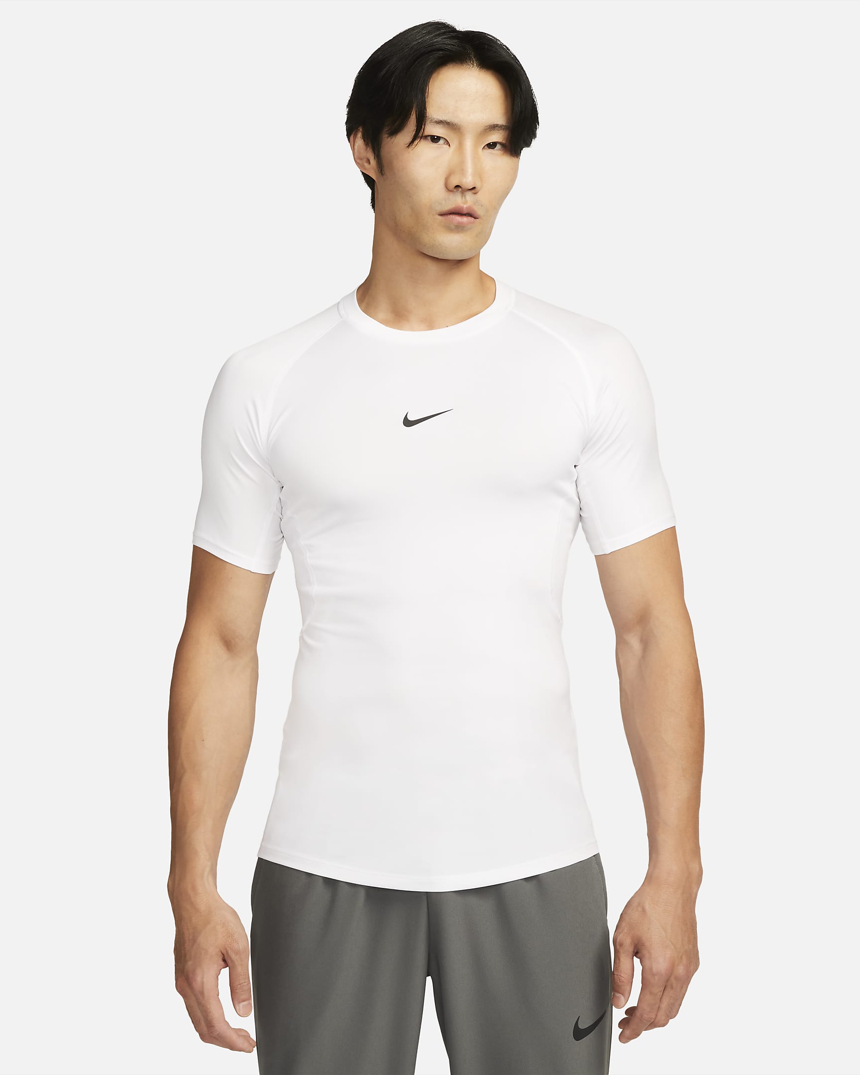 Tætsiddende Nike Pro Dri-FIT-fitnessoverdel med korte ærmer til mænd - hvid/sort