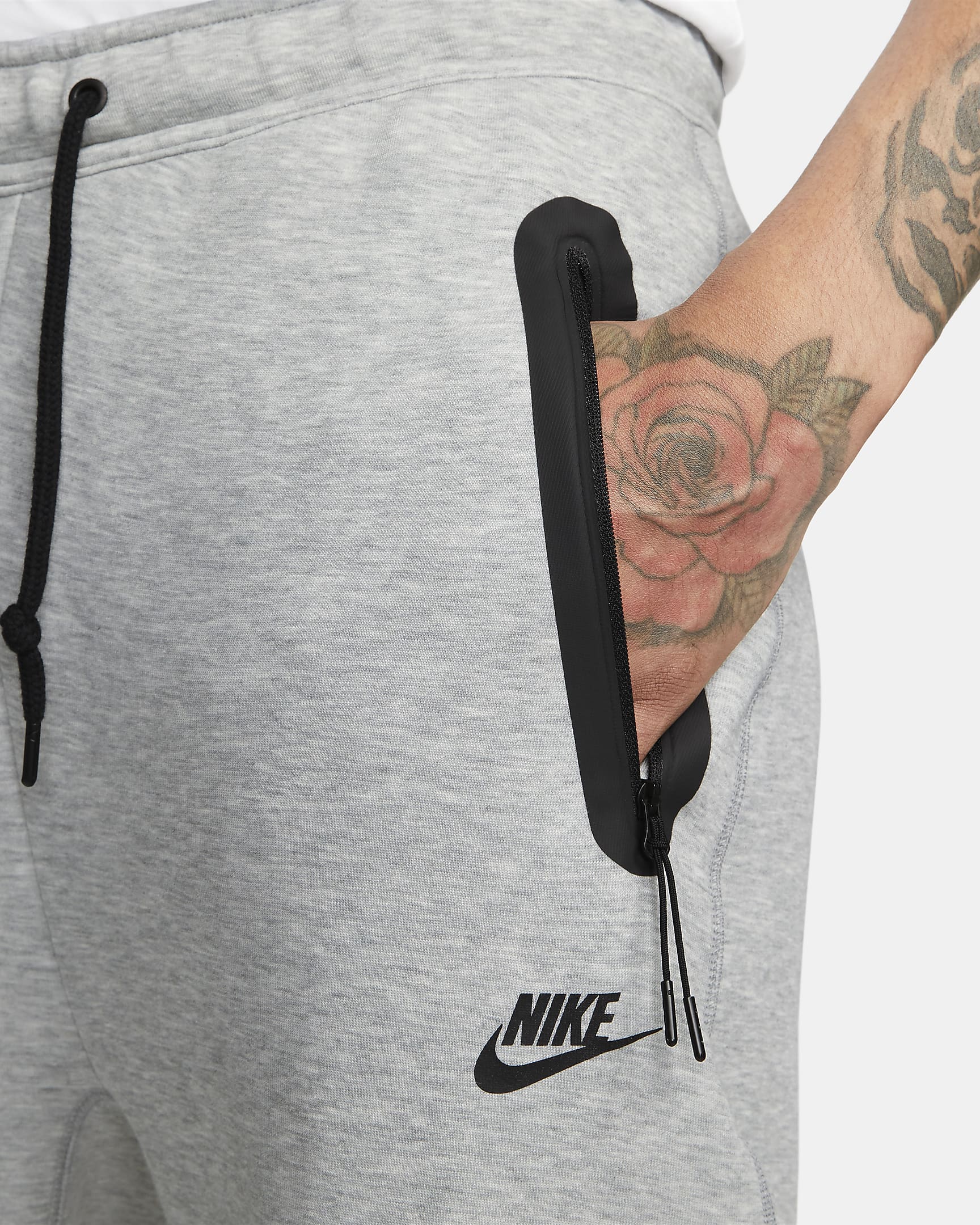 Nike Sportswear Tech Fleece joggebukse med åpen fald til herre - Dark Grey Heather/Svart