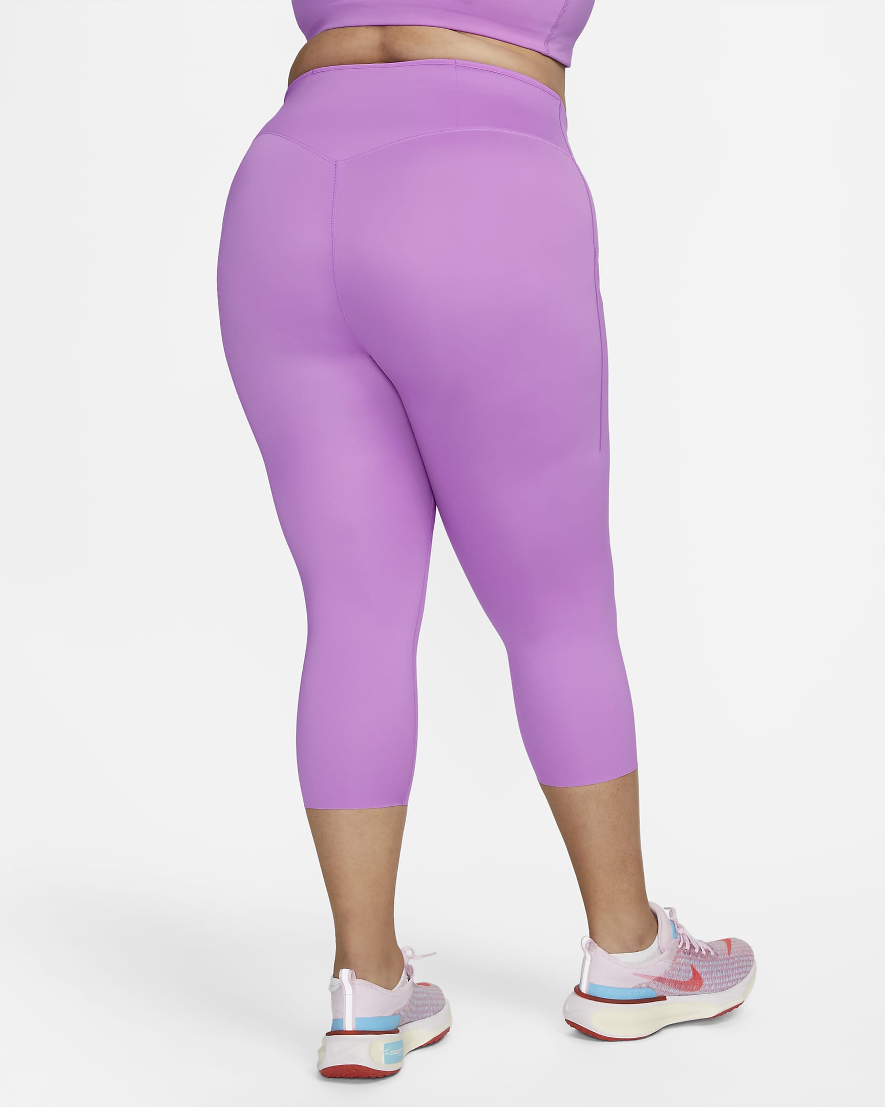 Leggings cropped de tiro alto y sujeción firme con bolsillos para mujer Nike Go (talla grande) - Fucsia enérgico/Negro