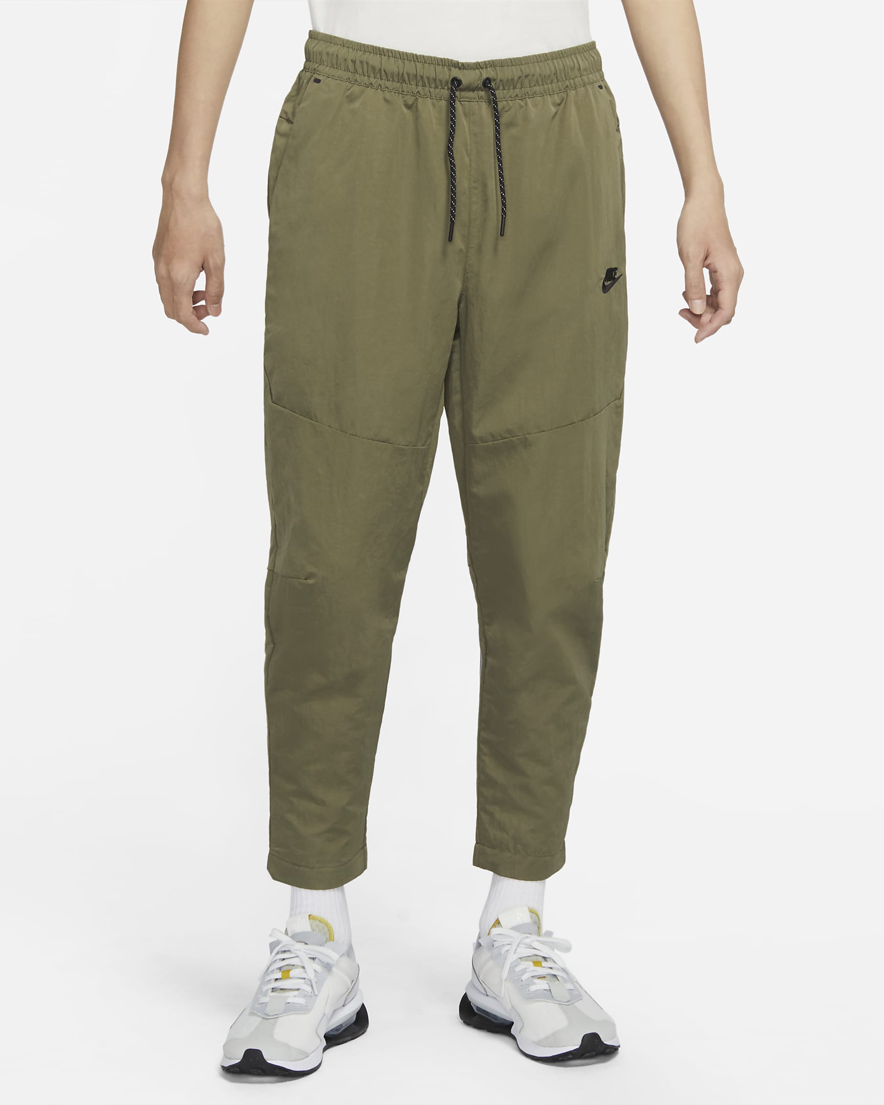 Nike Sportswear Tech Essentials Men's lined Commuter Pants. Nike.com