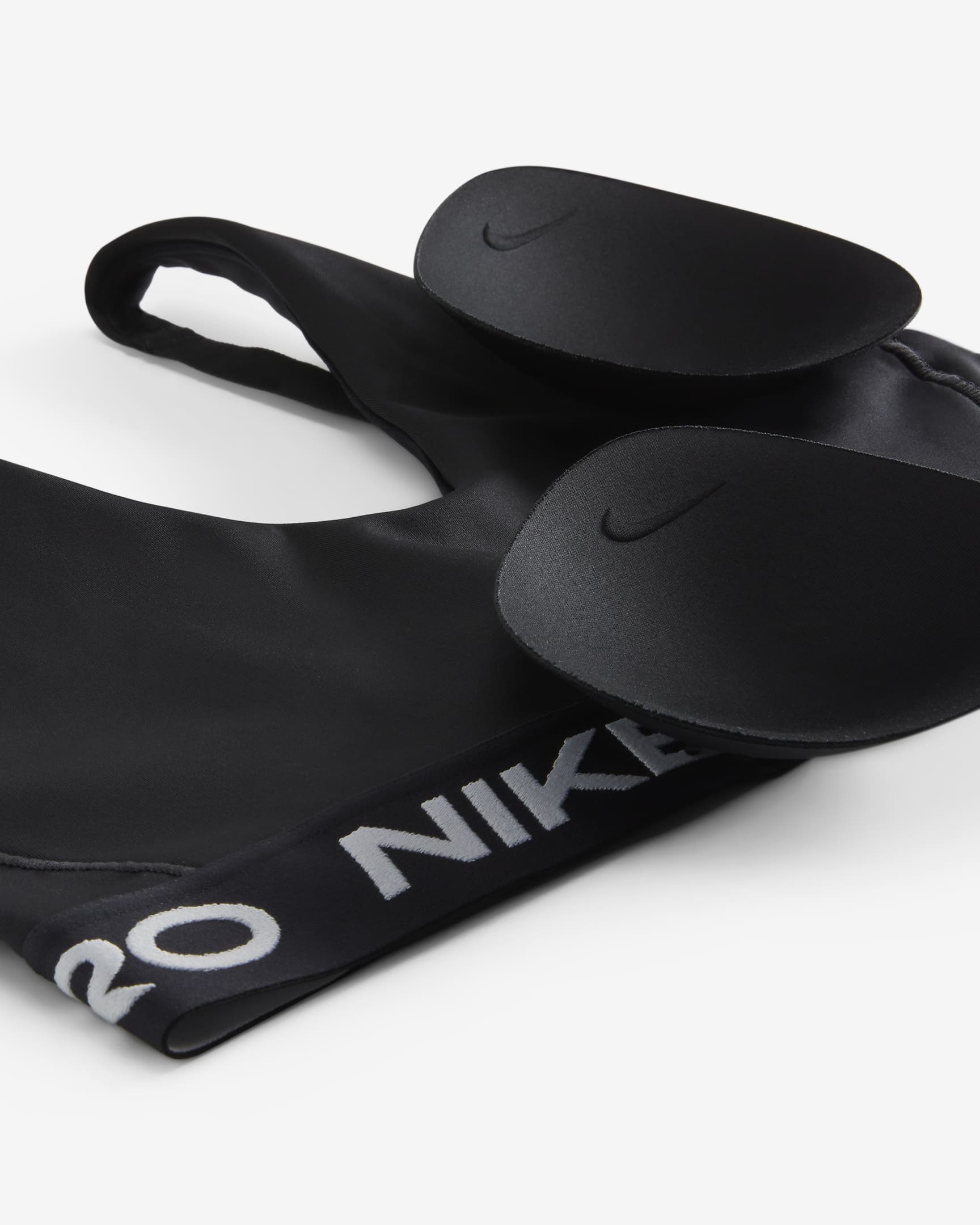 Dámská sportovní podprsenka Nike Pro Indy Plunge s vycpávkami a střední oporou - Černá/Bílá/Bílá