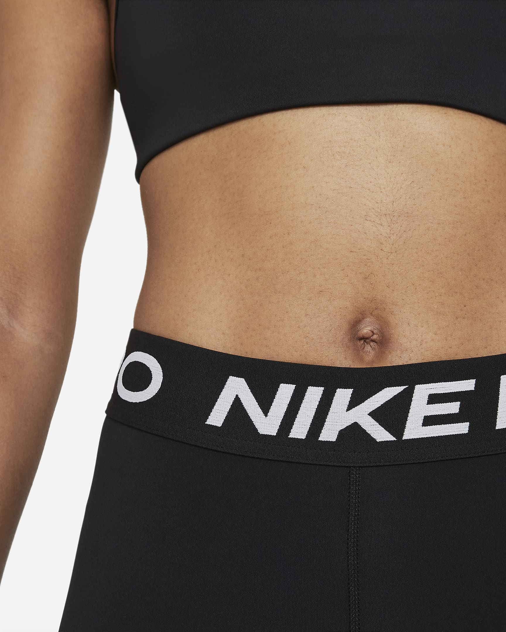 Damskie legginsy ze średnim stanem o skróconym kroju ze wstawkami z siateczki Nike Pro - Czerń/Biel